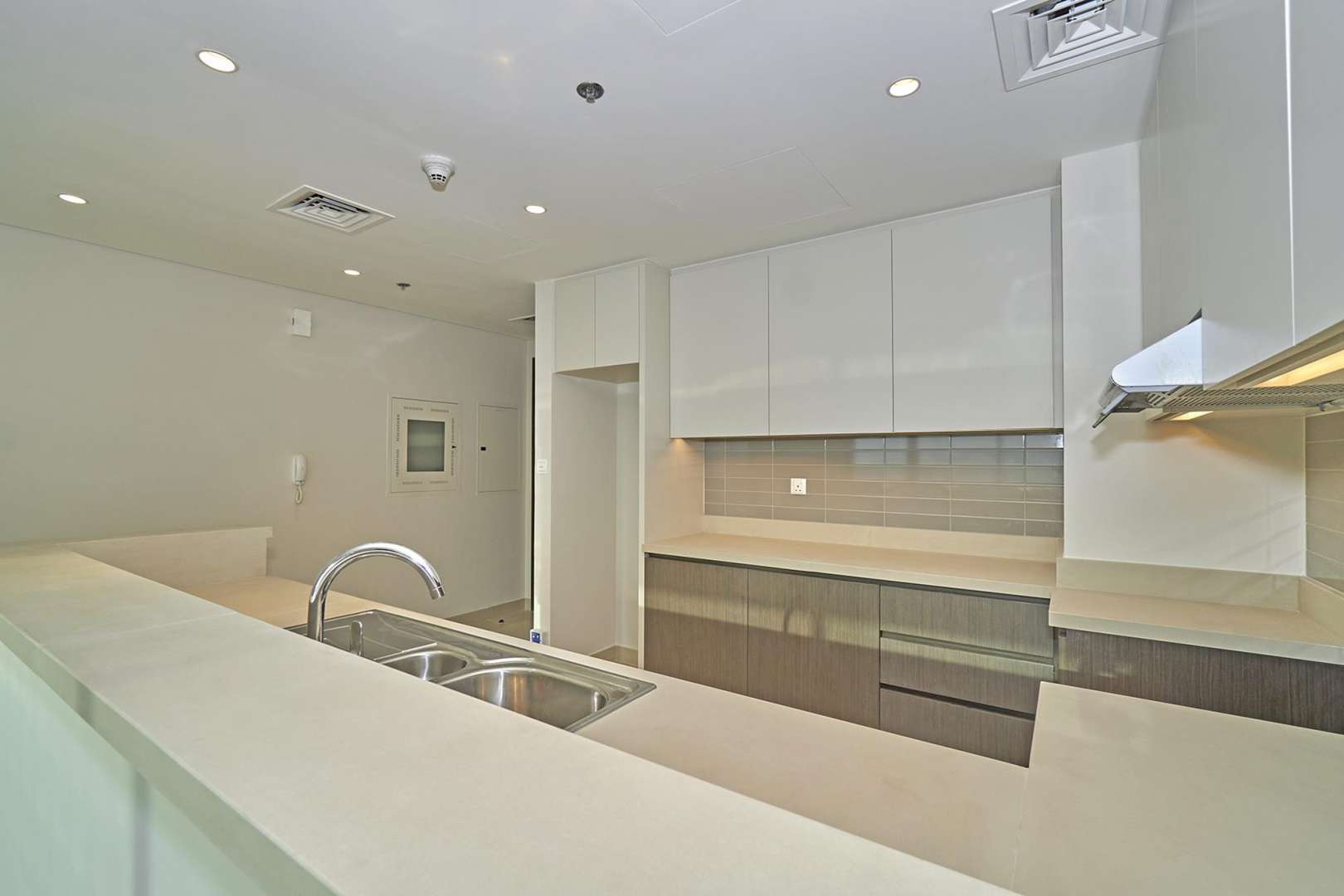 Modern open-plan kitchen in two-bedroom apartment, Dubai Creek Harbour, Harbour Views 1