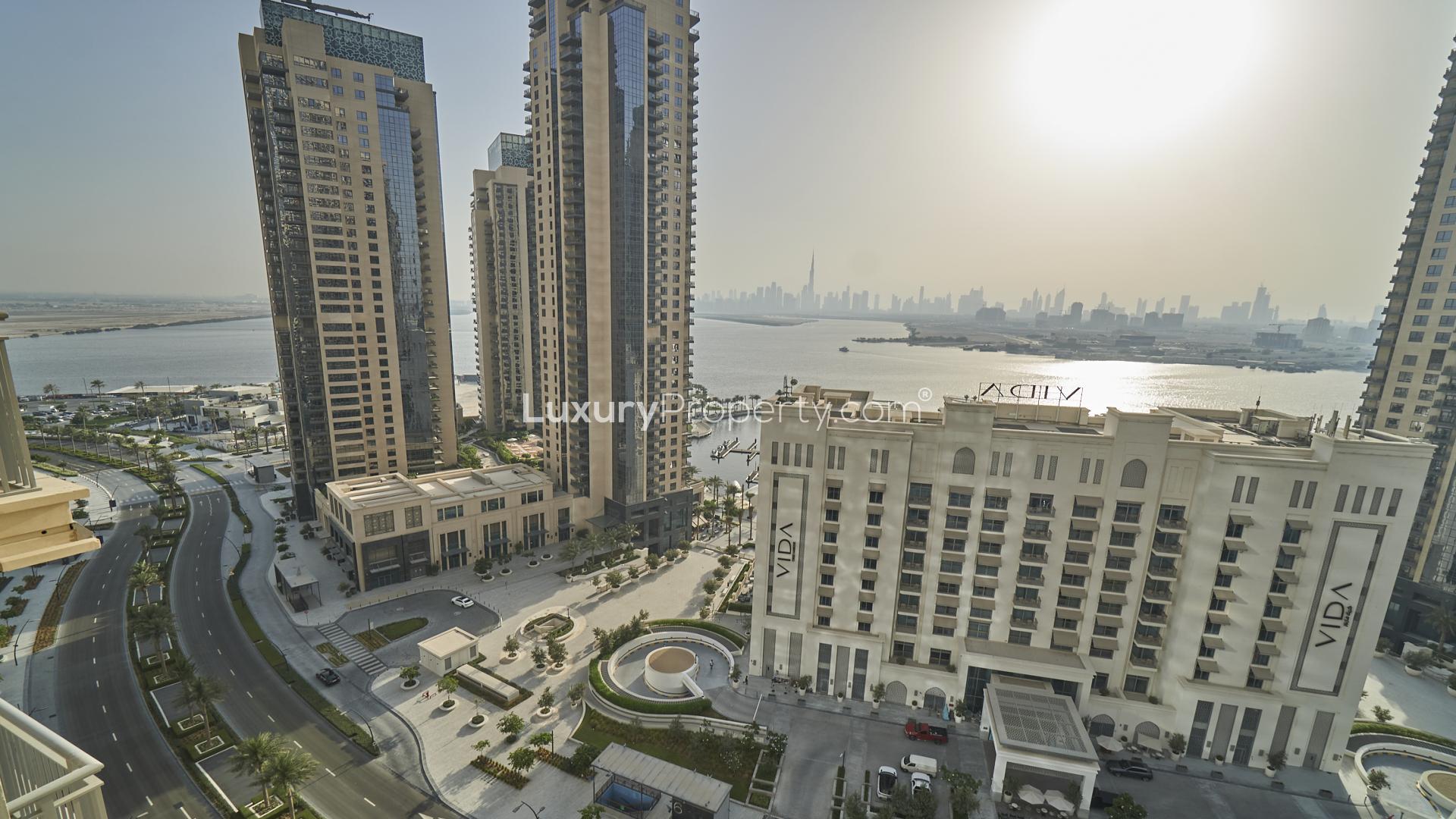 "Balcony view from 2-bedroom apartment in Harbour Views, Dubai Creek Harbour, skyline and water visible.","Dubai Creek Harbour skyline view from Harbour Views 1 apartment, showing waterfront and skyline.",Vacant 2-bedroom apartment living area with balcony view in Harbour Views, Dubai Creek Harbour