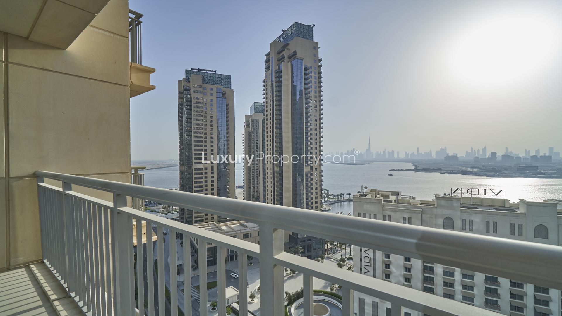 Vacant 2-bedroom apartment living room with balcony view in Harbour Views, Dubai Creek Harbour