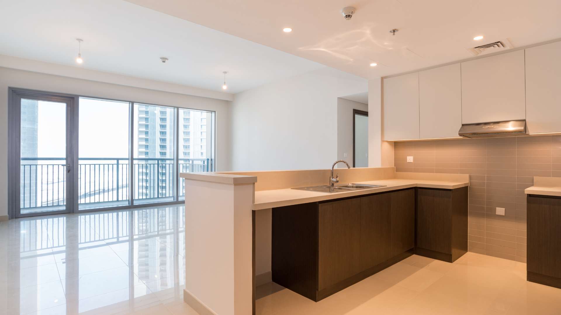 Corner two-bedroom apartment kitchen with balcony, Dubai Creek Harbour views, Harbour Views 2