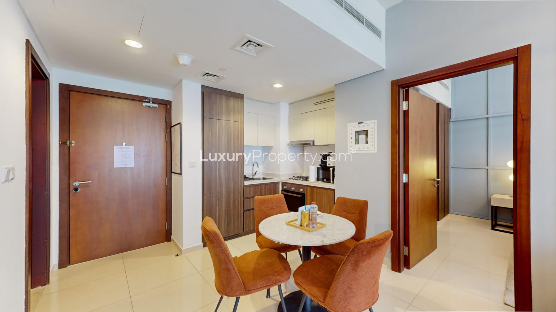 Dining area and kitchen in fully furnished 2-bedroom apartment, Reva Residences, Business Bay