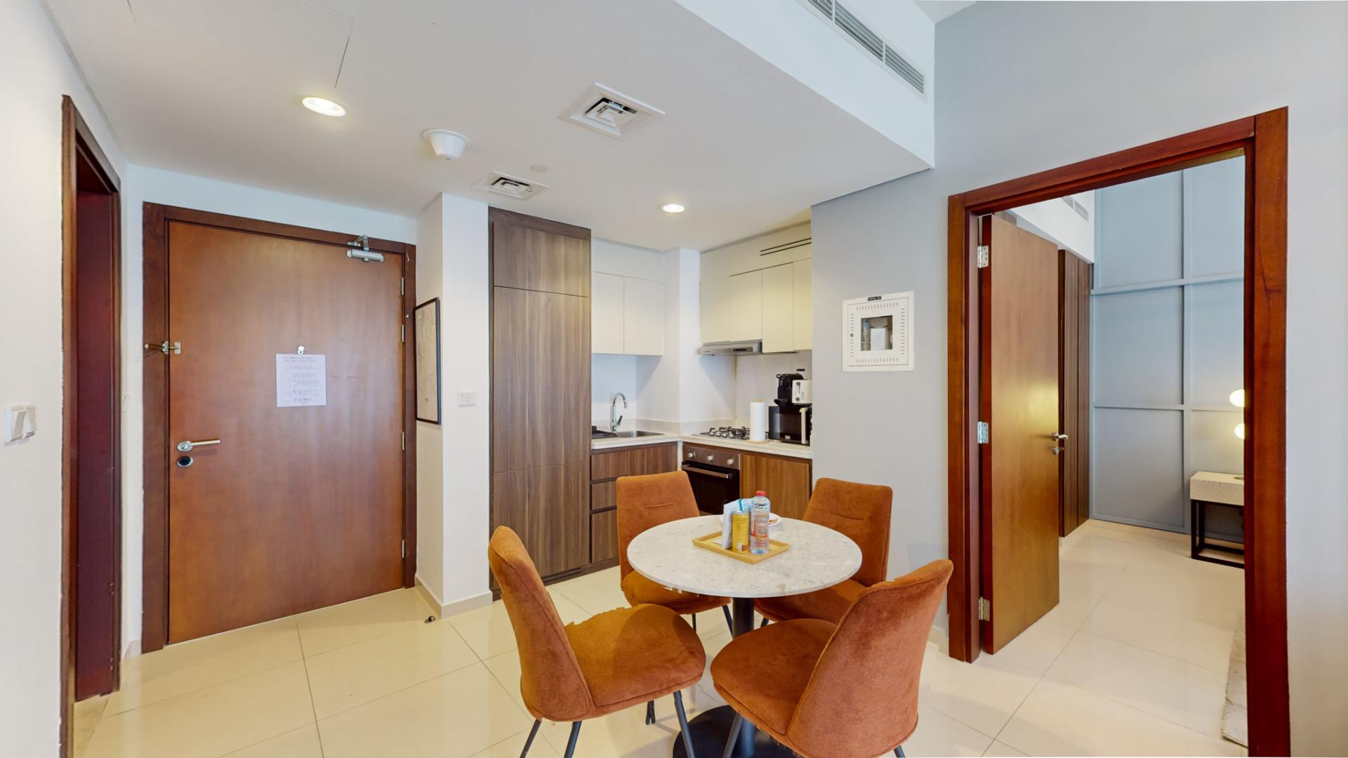 Dining area and kitchen in fully furnished 2-bedroom apartment, Reva Residences, Business Bay