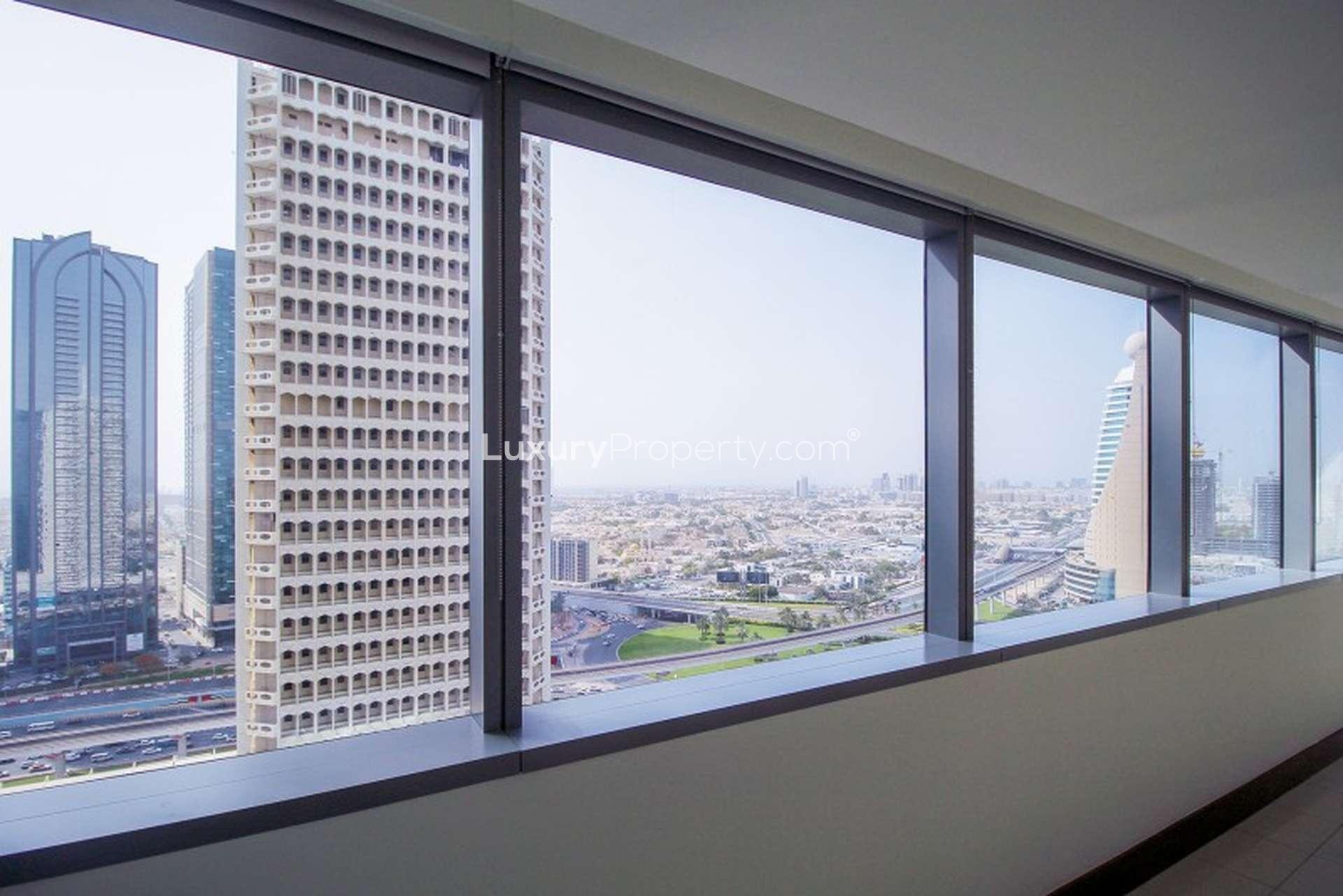 Luxurious bathroom with jacuzzi and glass sinks in Jumeirah Living apartment, World Trade Center