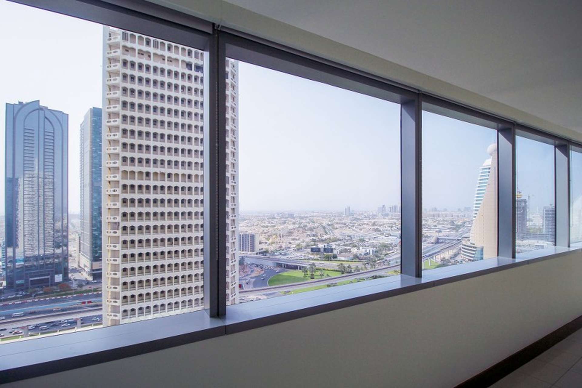 Luxurious bathroom with jacuzzi and glass sinks in Jumeirah Living apartment, World Trade Center
