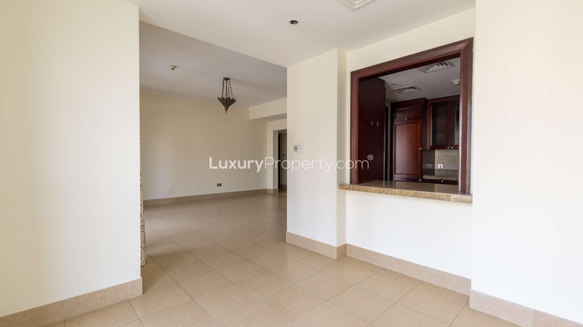 Laundry and bathroom area in Kamoon apartment, Old Town, featuring modern fixtures.