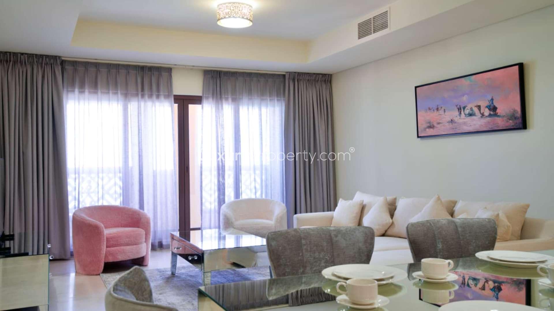 Furnished living and dining area in high-floor Palm Jumeirah apartment for rent, Kingdom of Sheba