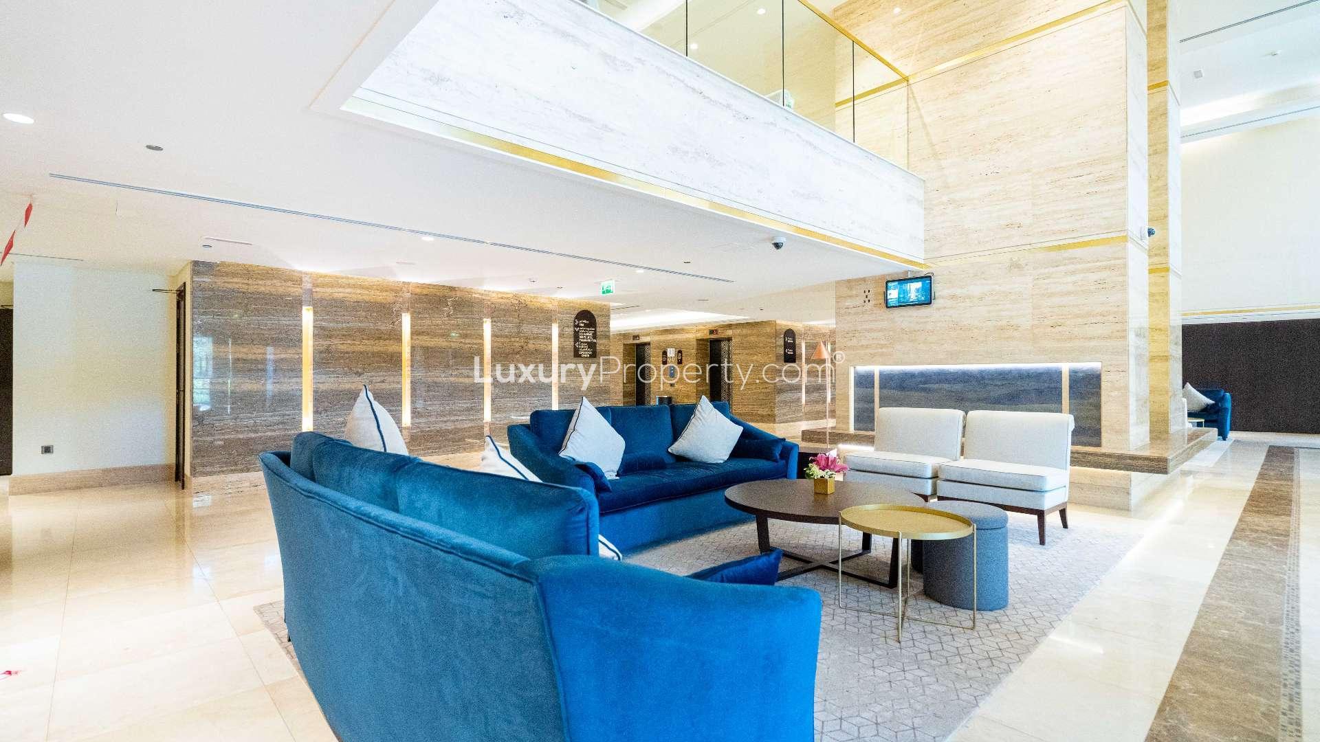 Luxurious poolside view from high-floor apartment in Palm Jumeirah, Kingdom of Sheba