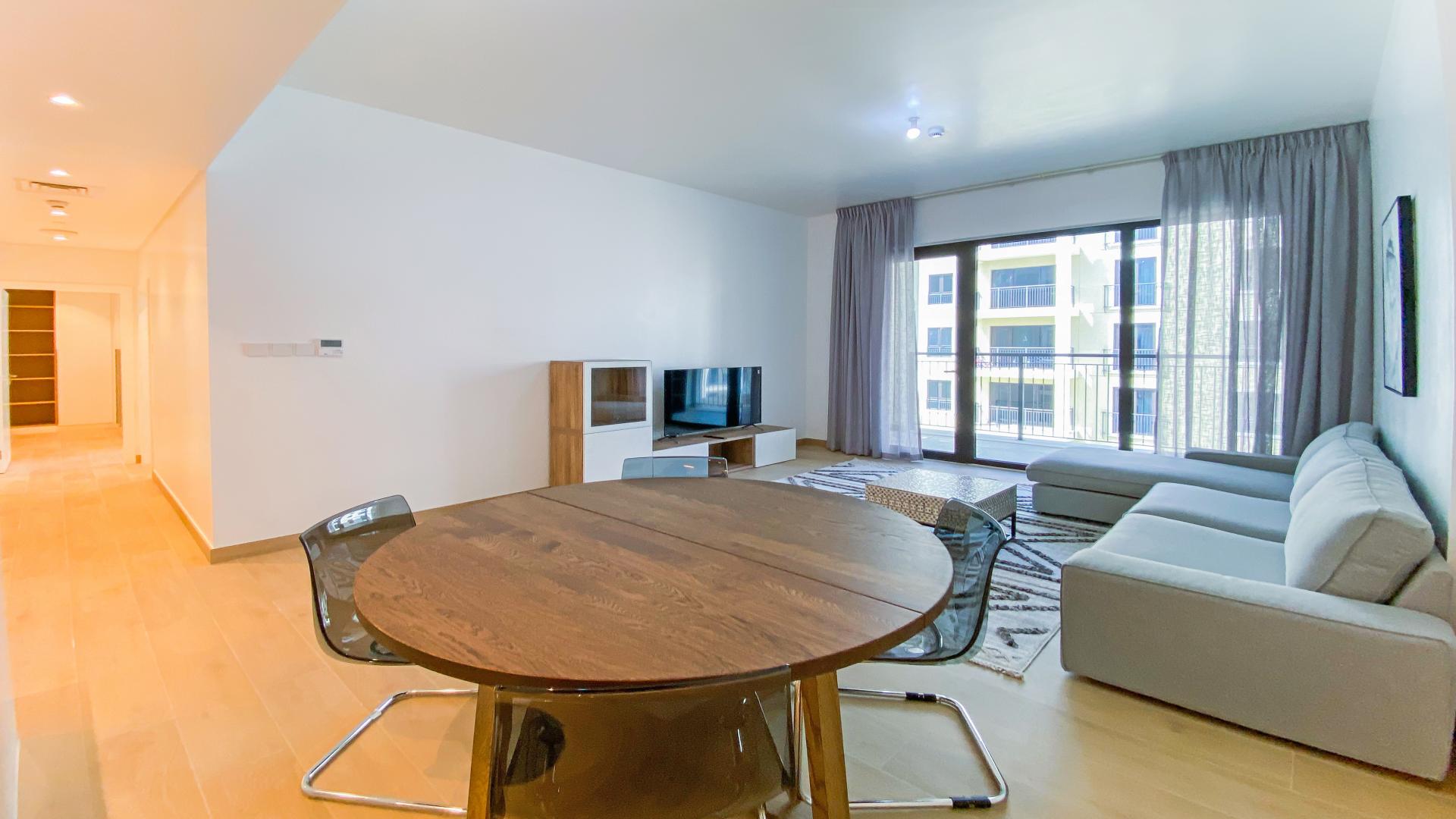 Elegant living room in 2-bedroom apartment, Porte De La Mer, Dubai, with modern decor