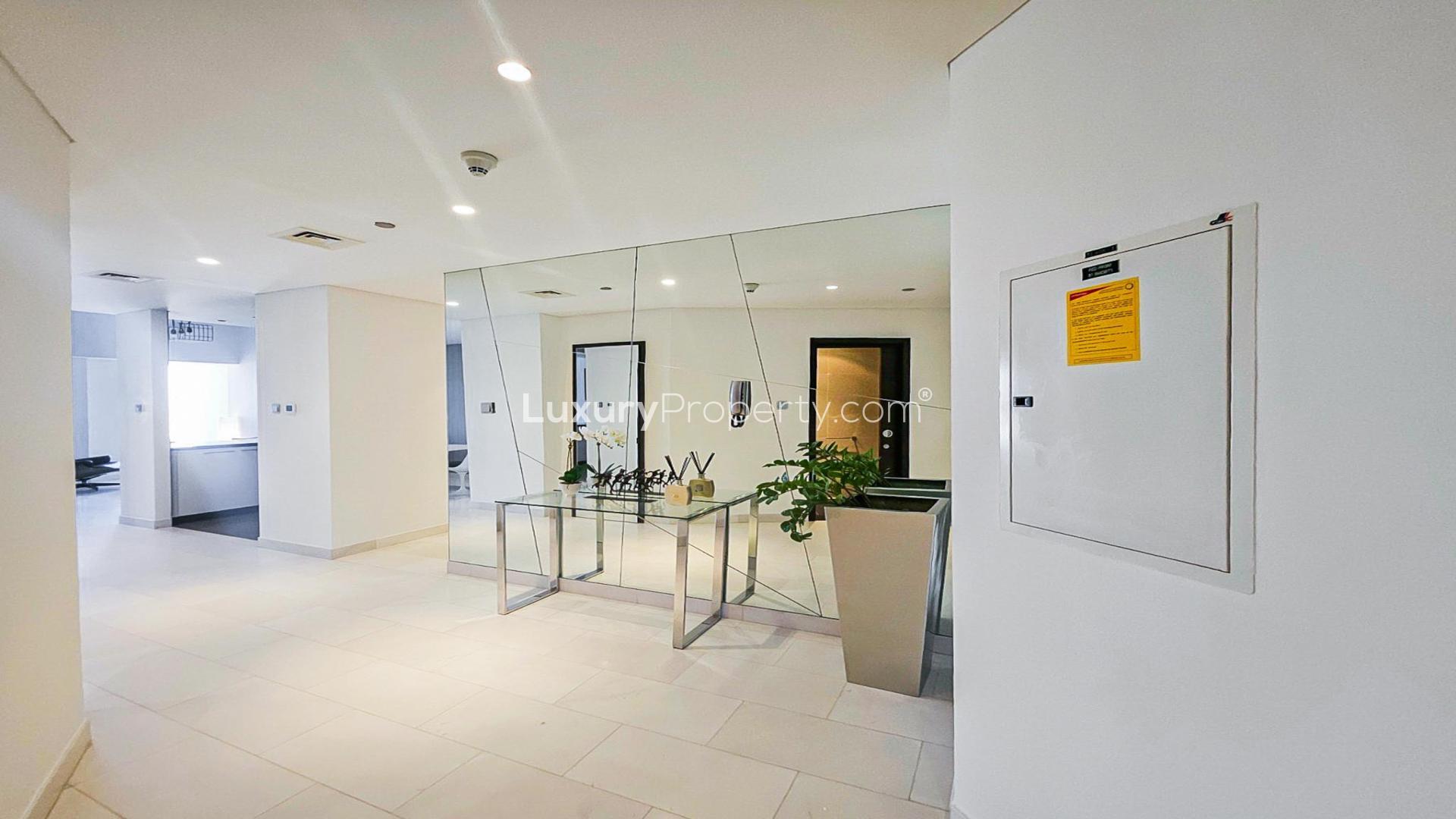 Luxurious bedroom in Cayan Tower apartment, Dubai Marina, with modern decor and city view