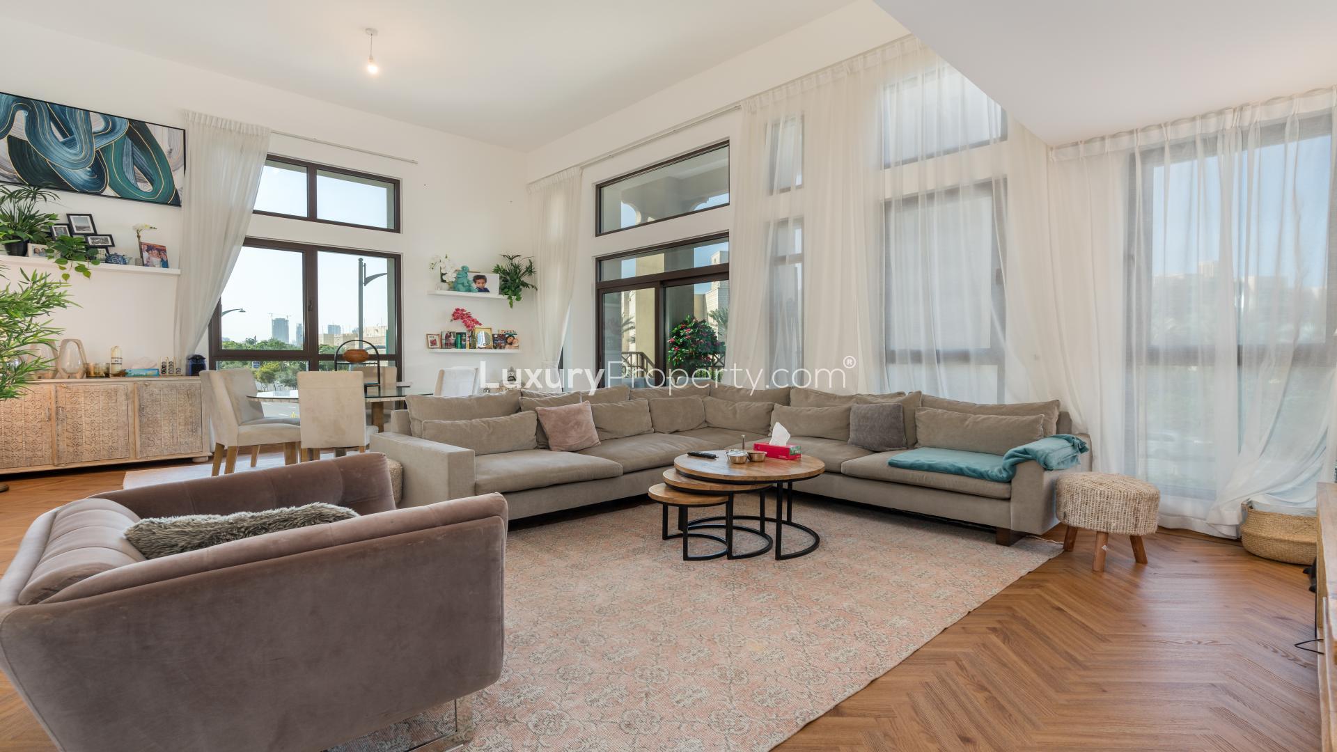 Modern living room in 2-bedroom apartment, Madinat Jumeirah, with elegant decor and cozy seating