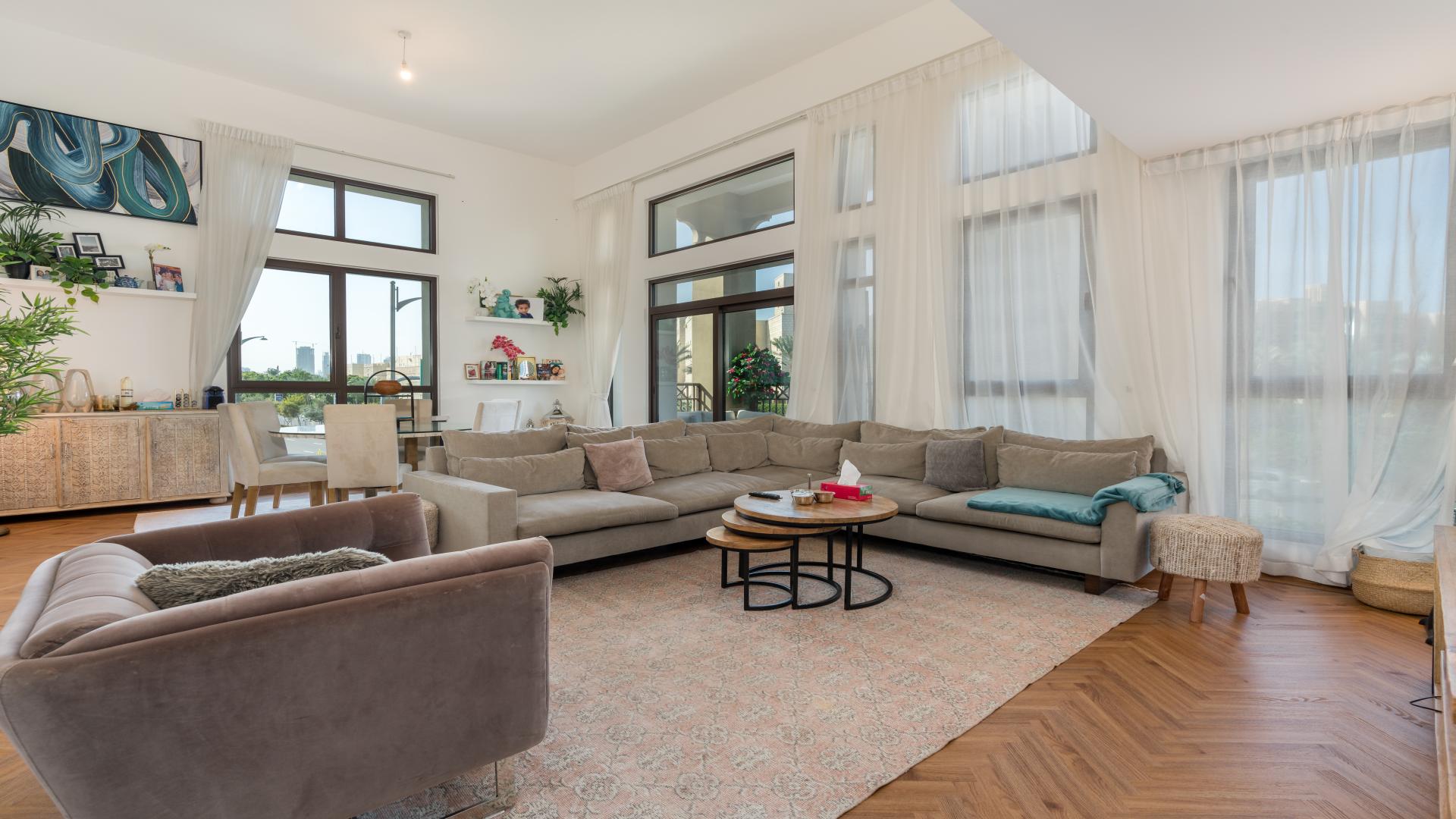 Modern living room in 2-bedroom apartment, Madinat Jumeirah, with elegant decor and cozy seating