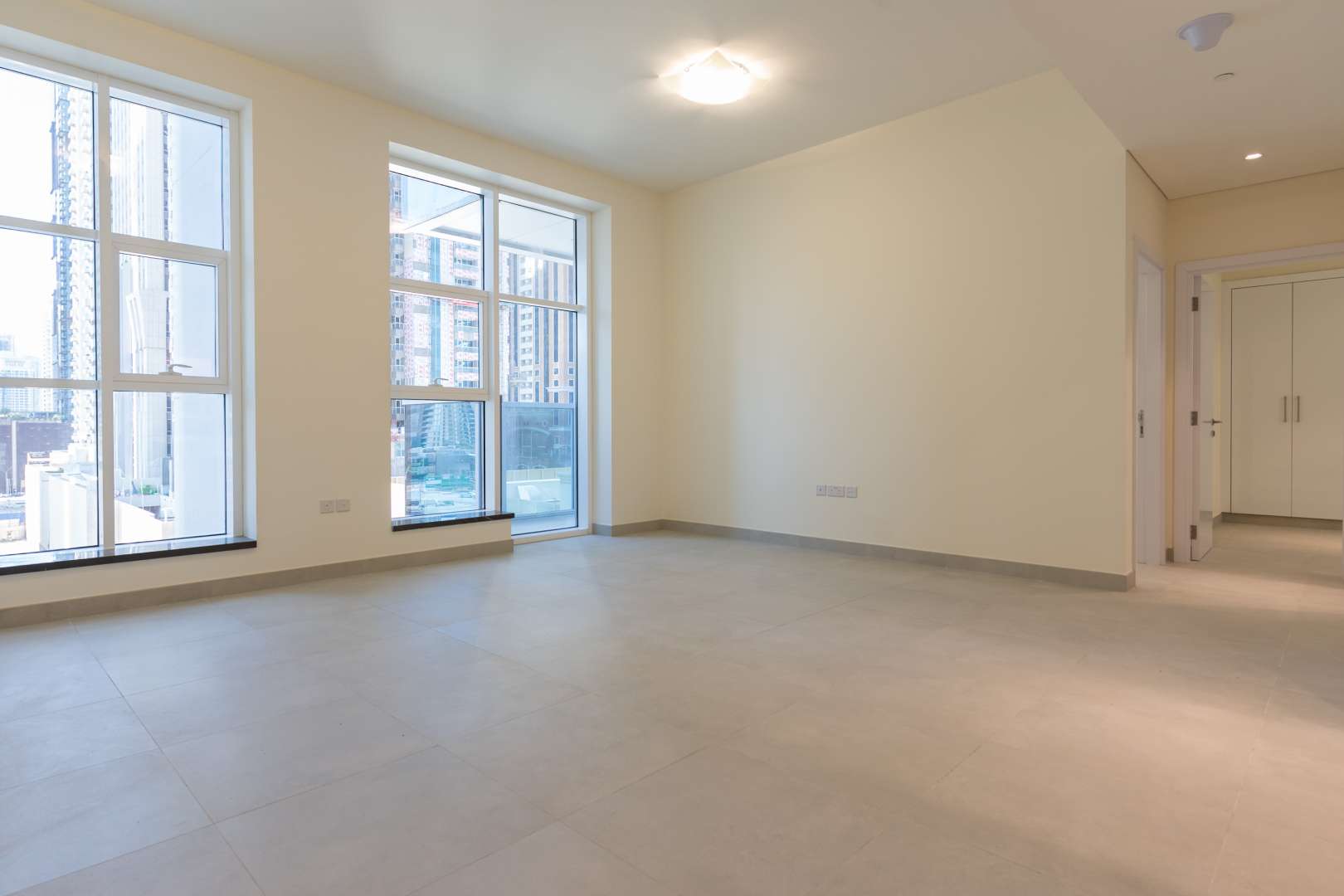 N/A,Sunlit living room in 2-bed apartment, Marina Arcade Tower, Dubai Marina