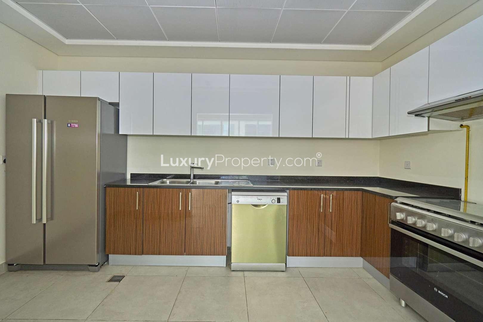 Spacious living room with large windows in Marina Arcade apartment, Dubai Marina for rent