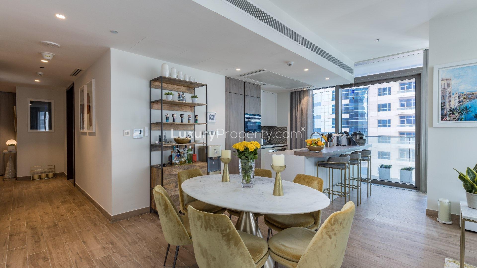 Luxurious living room in Marina Gate apartment with modern decor and city views