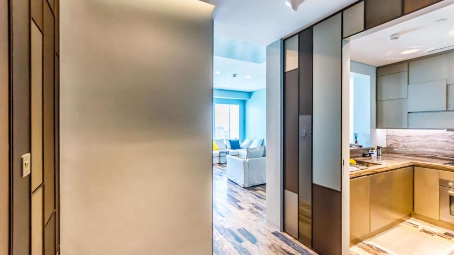 Modern kitchen and living area in luxury 2-bedroom apartment, Marina Heights, Dubai Marina