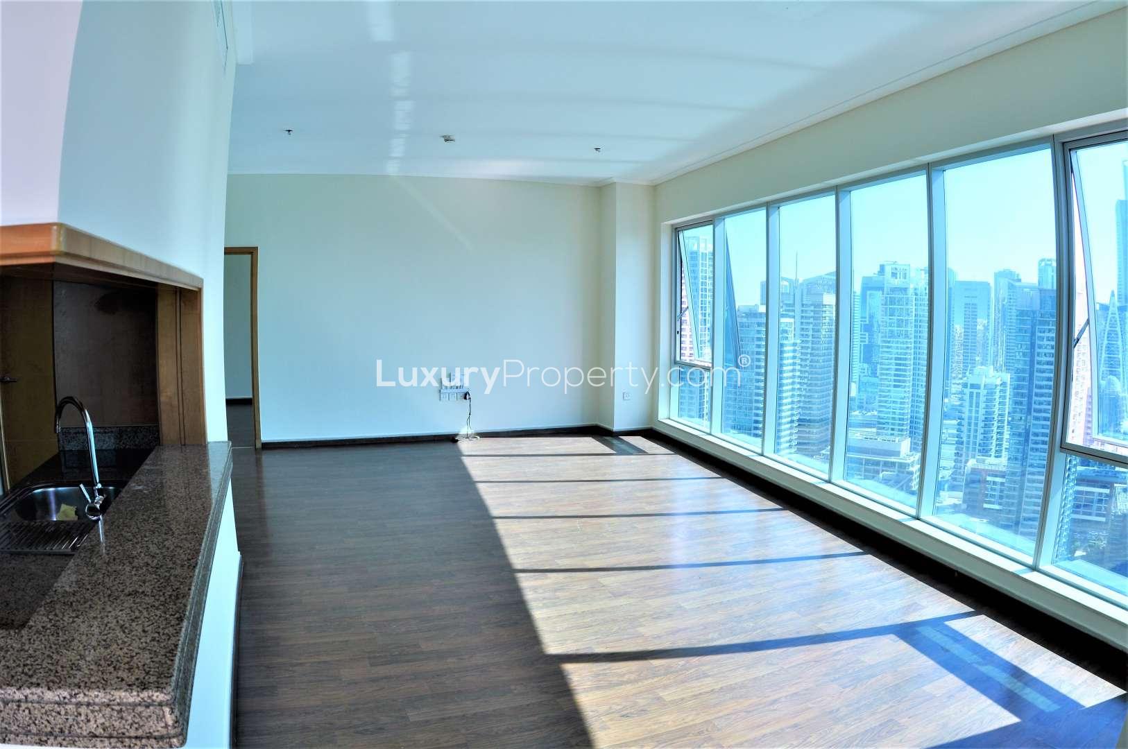 High-floor apartment balcony view of Dubai Marina skyline and waterfront, Marina Promenade