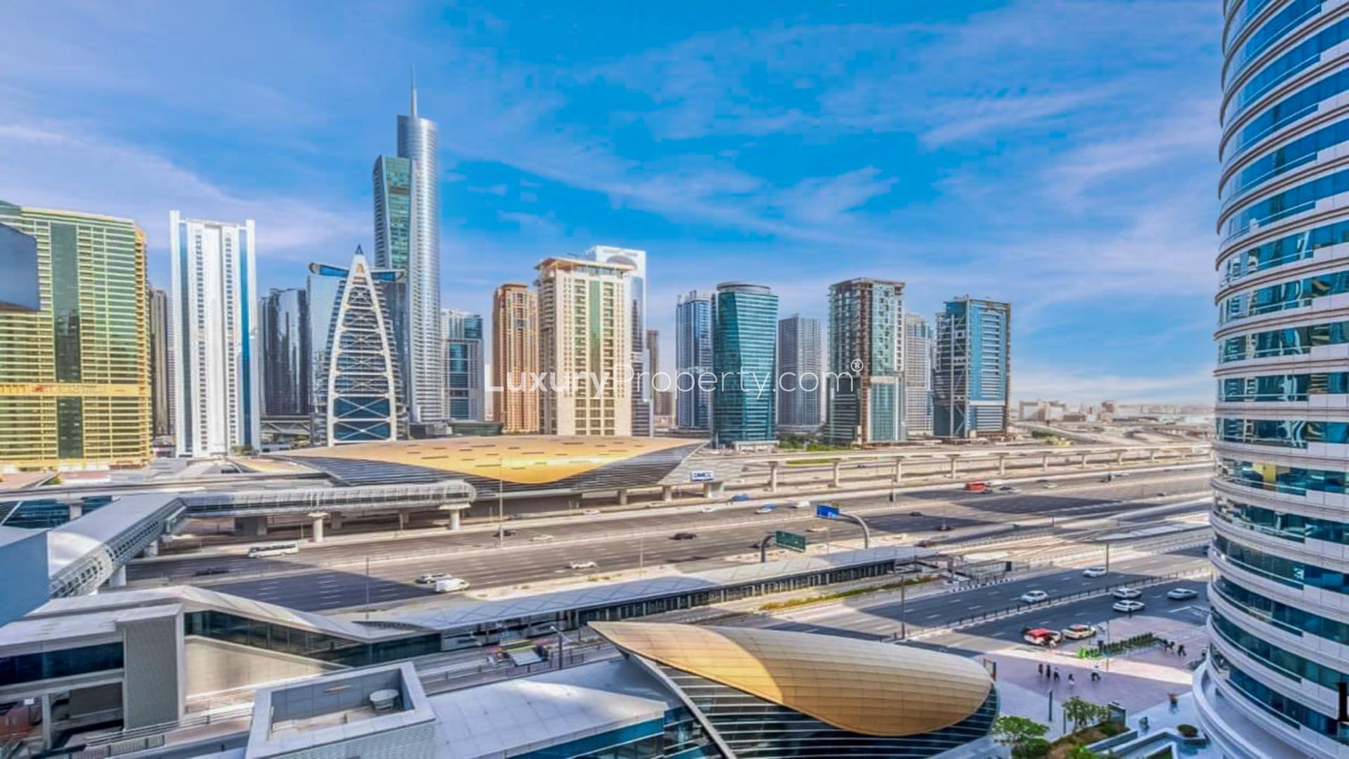 Balcony view from 2-bedroom apartment in Marina Residence, Dubai Marina, showcasing city skyline