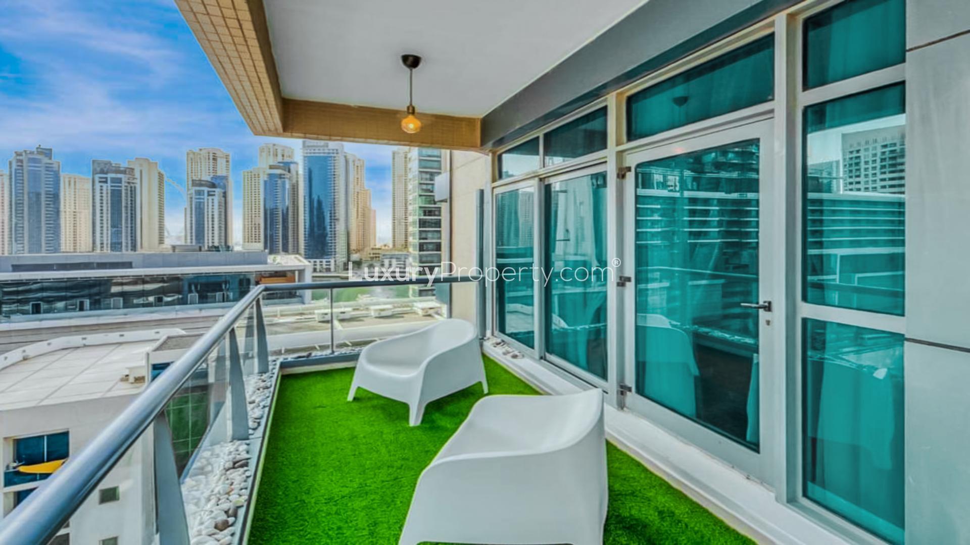 Dubai Marina skyline view from Marina Residence apartment, showcasing modern architecture and highways