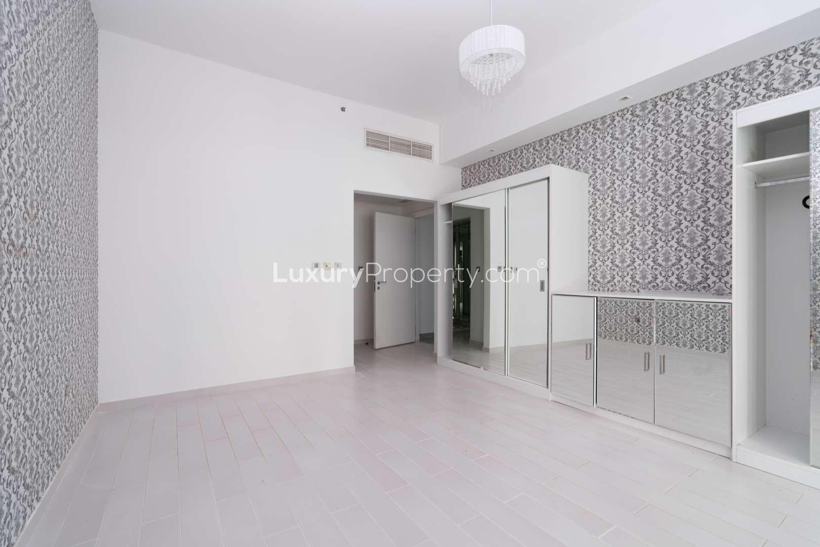 Bright living room with large windows in Marina Residence, Palm Jumeirah apartment for rent