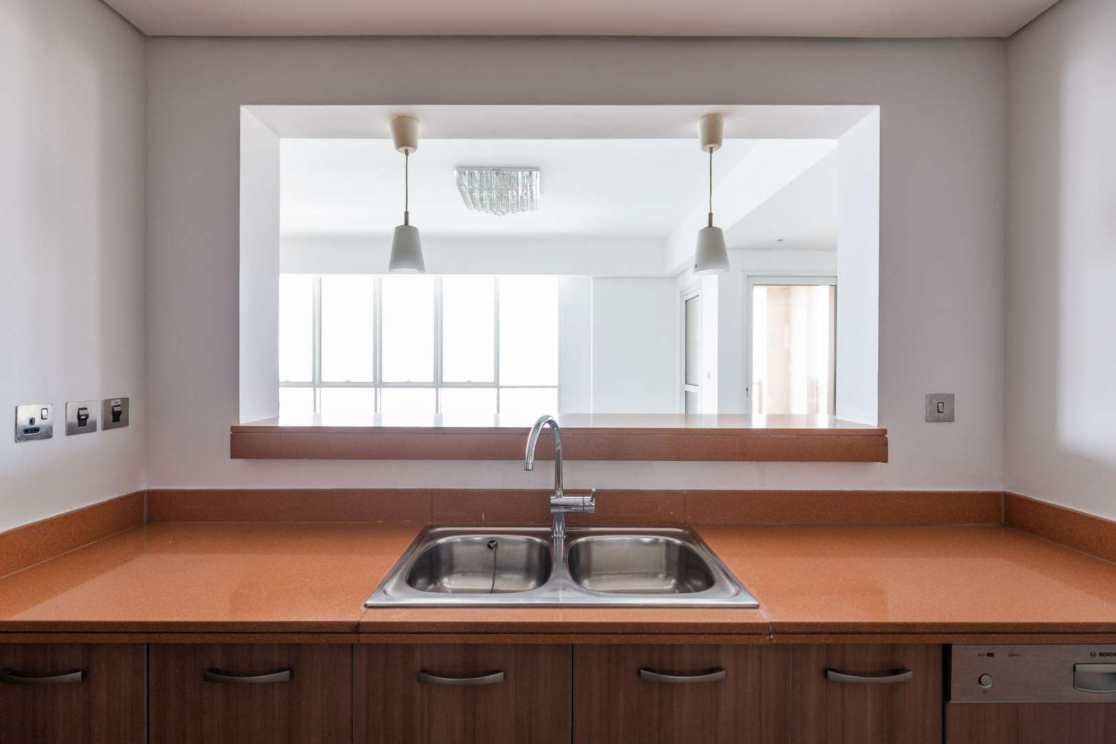 Empty living room with hardwood floors in Marina Residences apartment, Palm Jumeirah