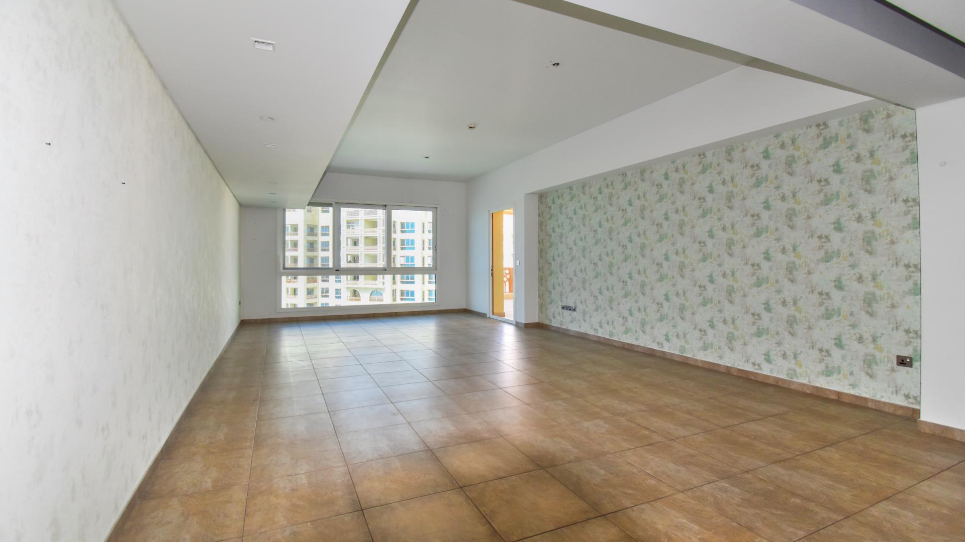 "View from two-bedroom apartment balcony overlooking marina in Palm Jumeirah, Marina Residences.",Spacious living area in Marina Residences two-bedroom apartment, Palm Jumeirah, available for rent