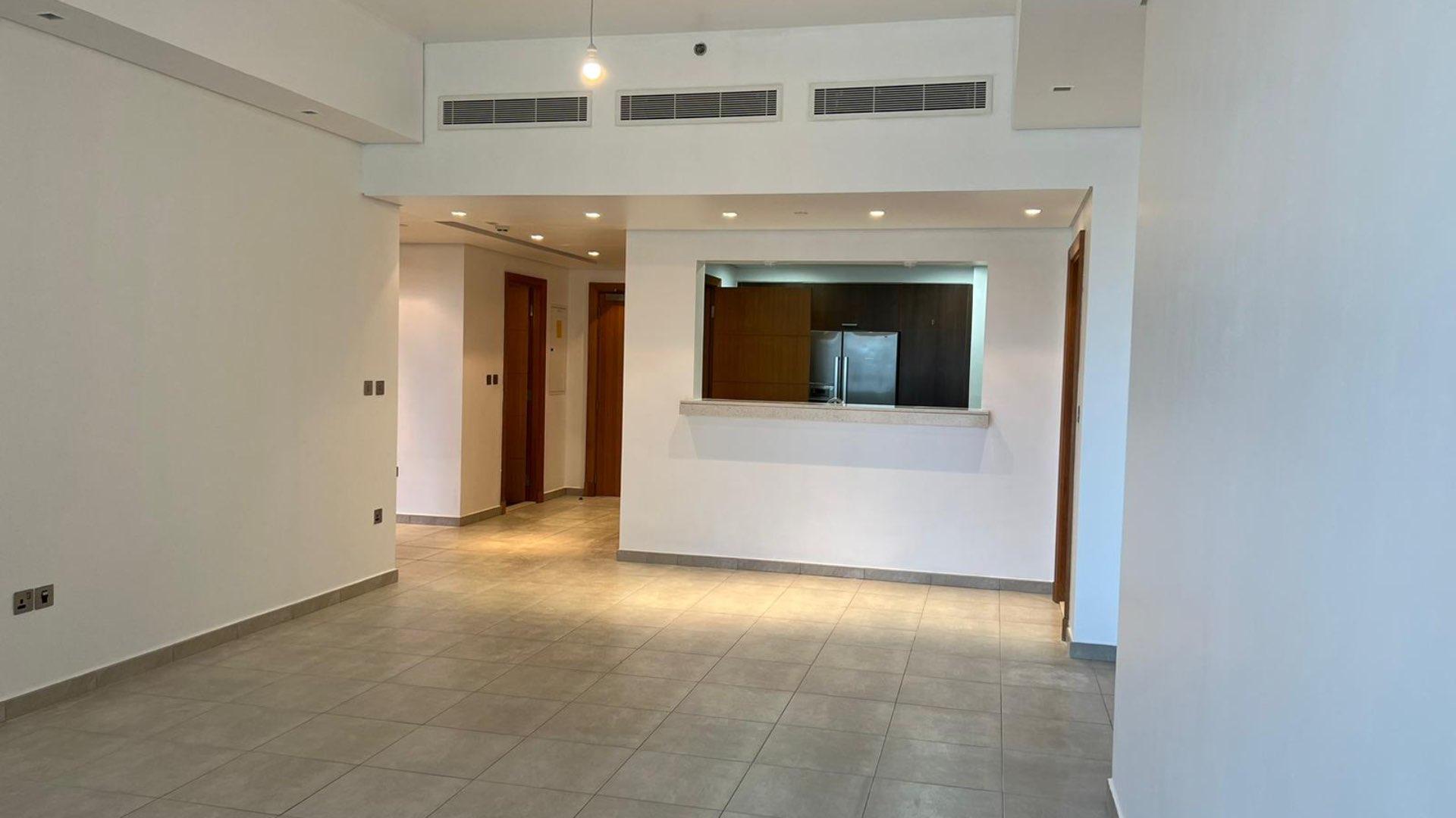 "Palm Jumeirah Marina view from vacant 2-bedroom apartment for rent, stunning waterfront.",Vacant 2-bedroom apartment interior with open kitchen in Marina Residences, Palm Jumeirah