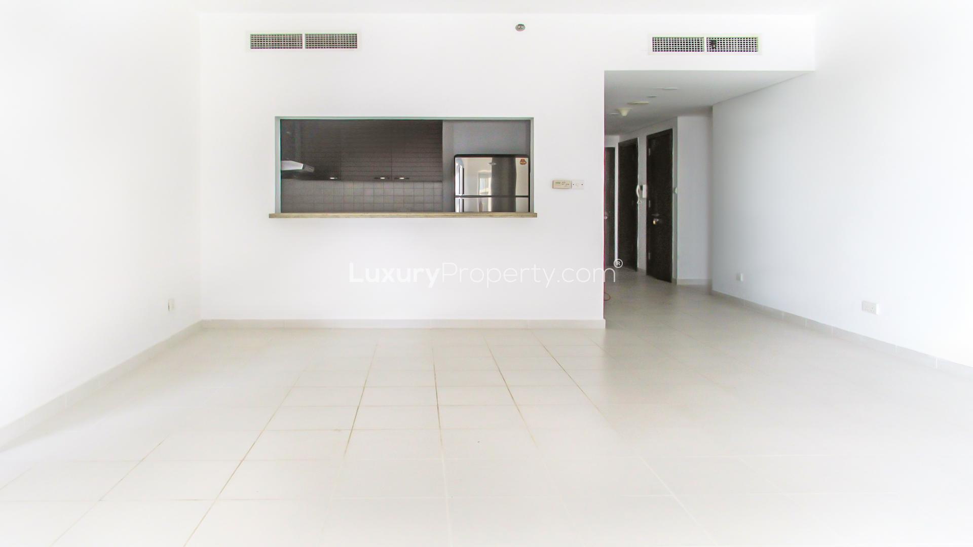 Spacious living area in two-bedroom Marina Tower apartment, Dubai Marina, available for rent