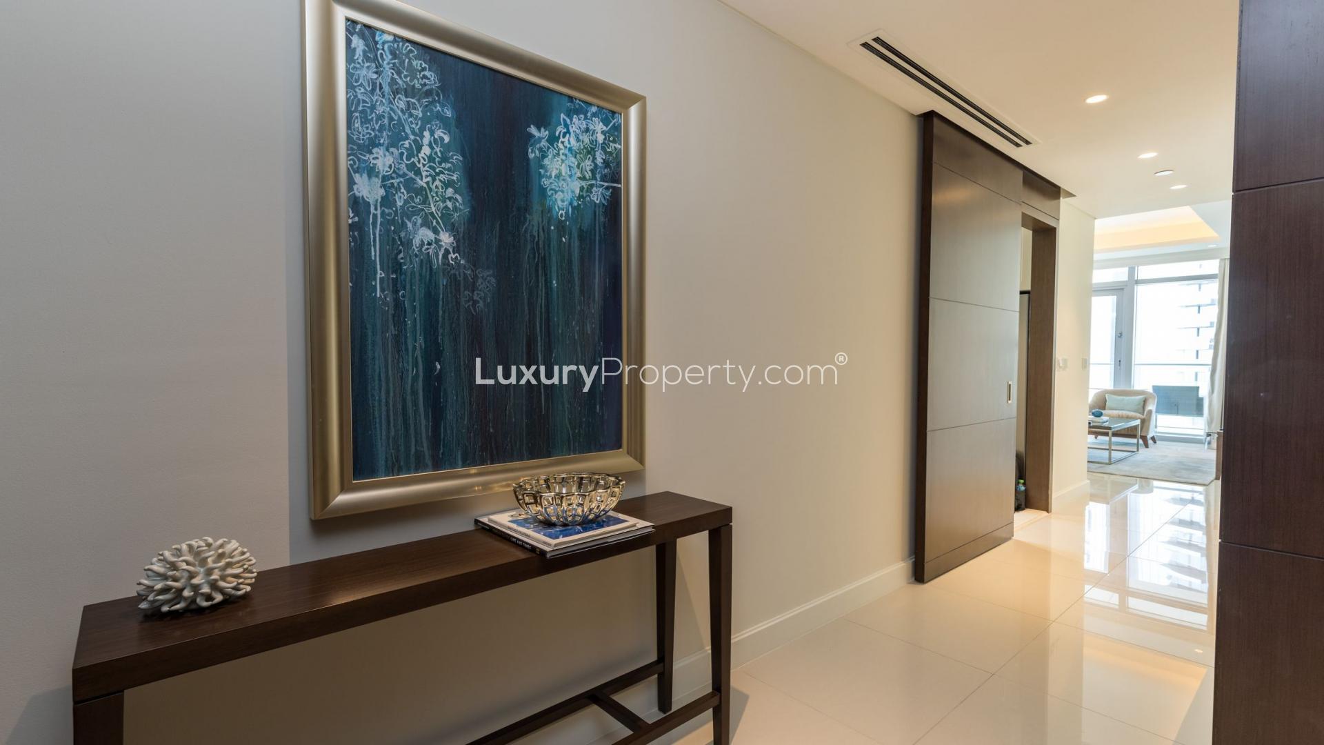 Modern living room in Downtown Dubai apartment with Burj Khalifa view, elegant decor