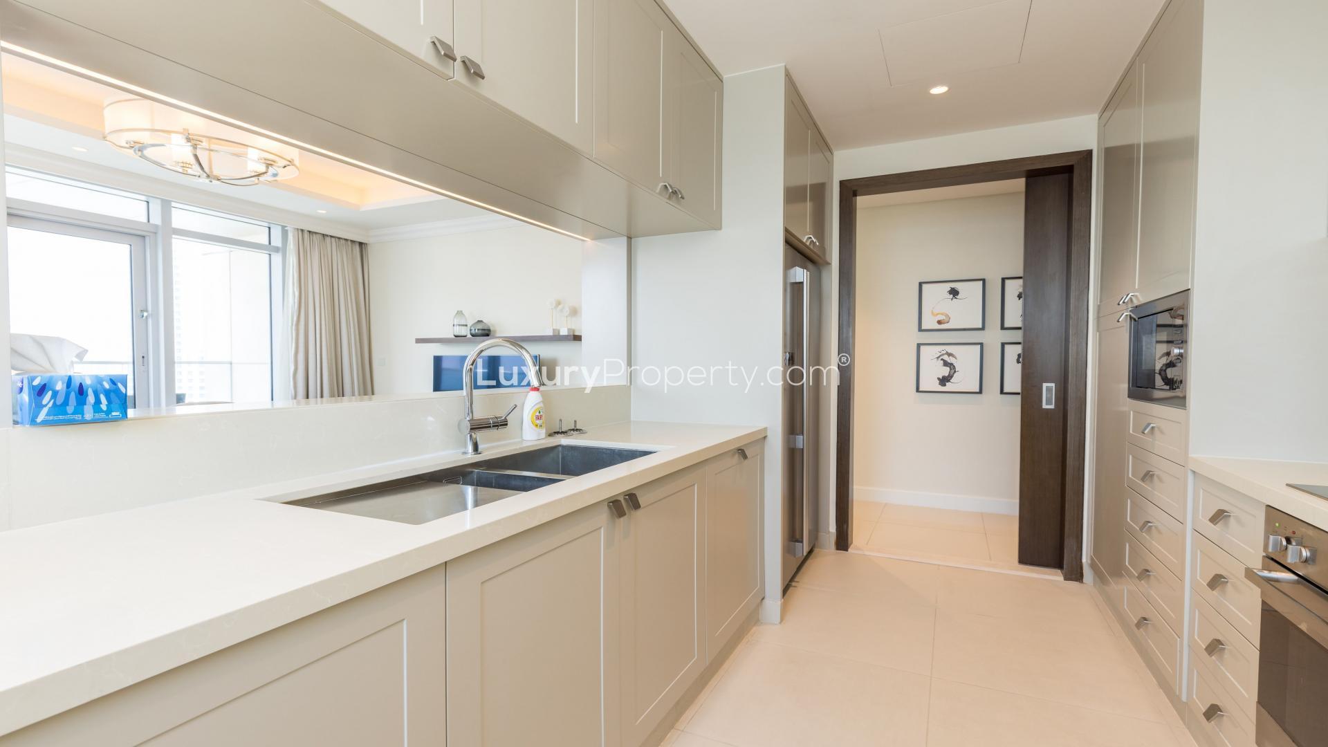 Luxurious living room in The Address Fountain Views apartment, Downtown Dubai, with modern furnishings