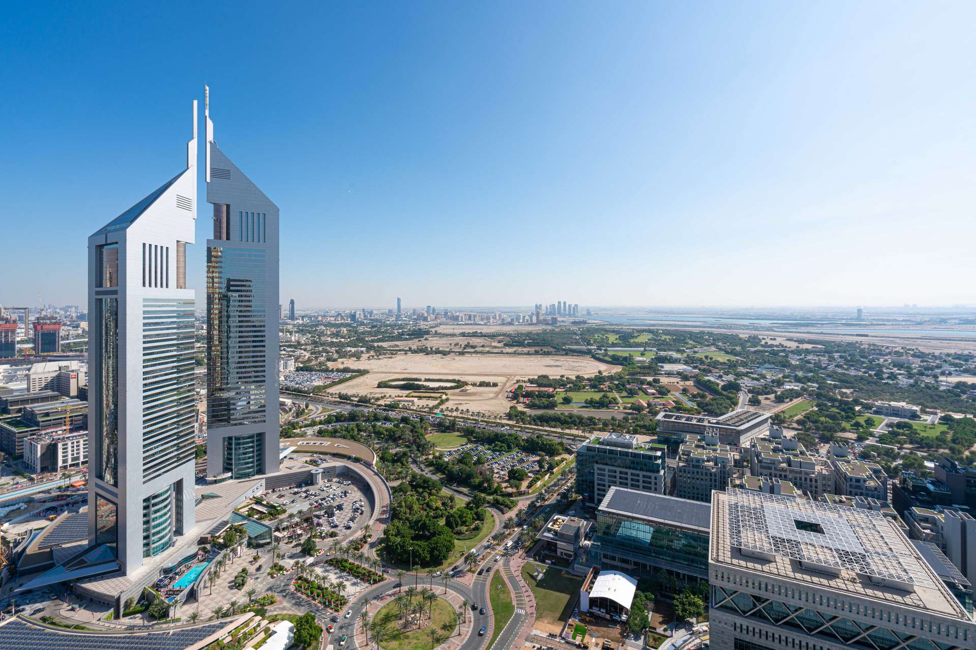 Empty luxury apartment room with city skyline views in Maze Tower, DIFC