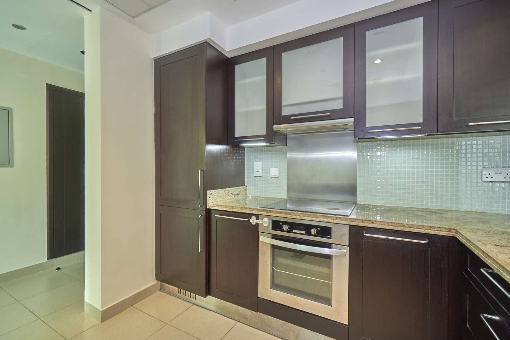 Modern open-plan living area with kitchen in 2-bedroom Mosela apartment, The Greens