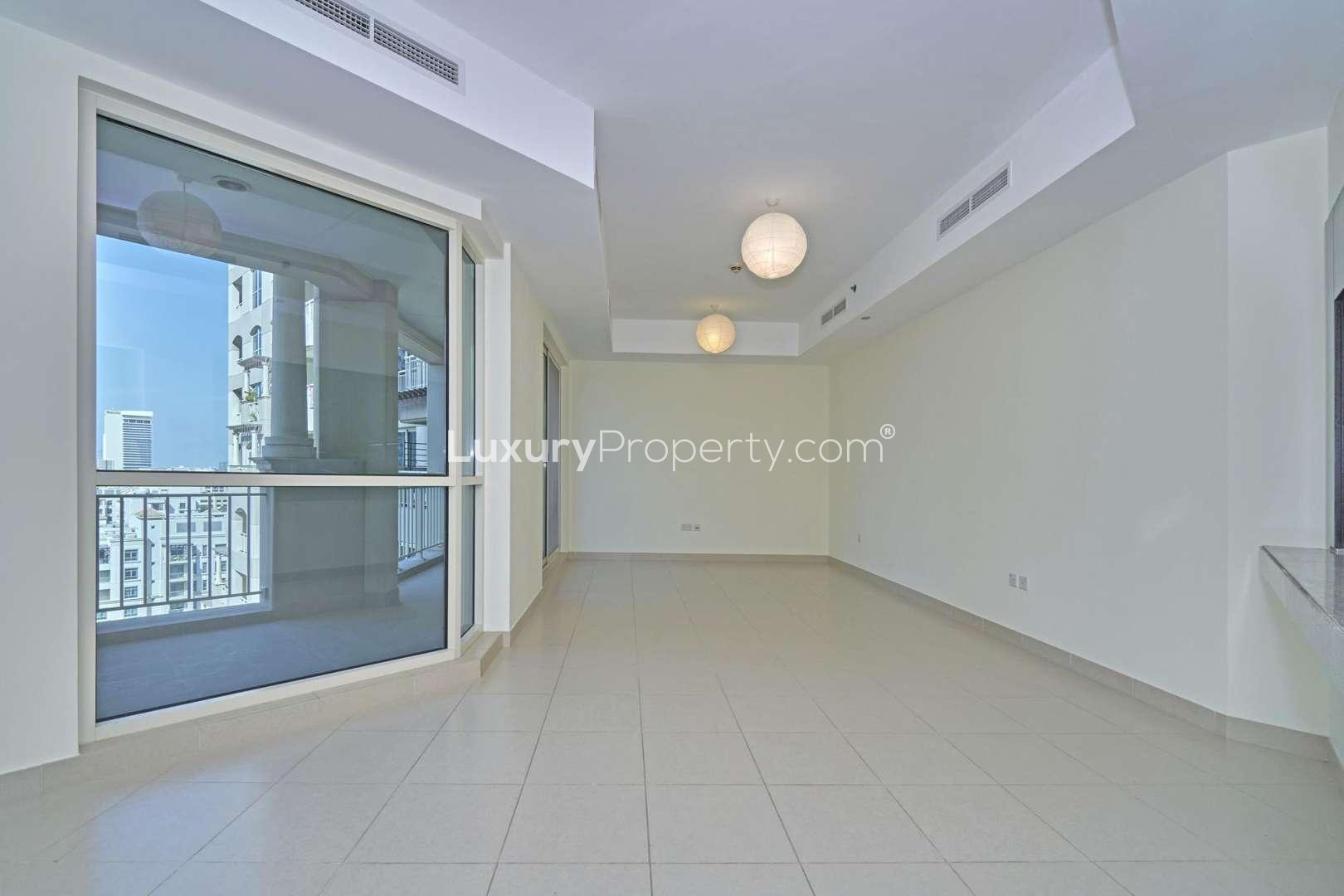 Aerial view of Mosela apartment buildings with lake in The Views, Dubai