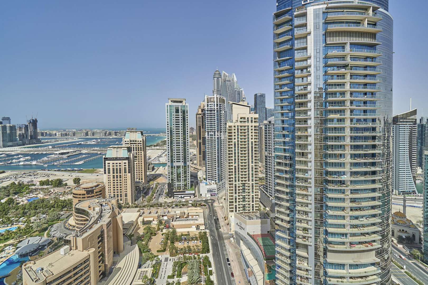 Spacious living room in Murjan apartment, Jumeirah Beach Residence with city view