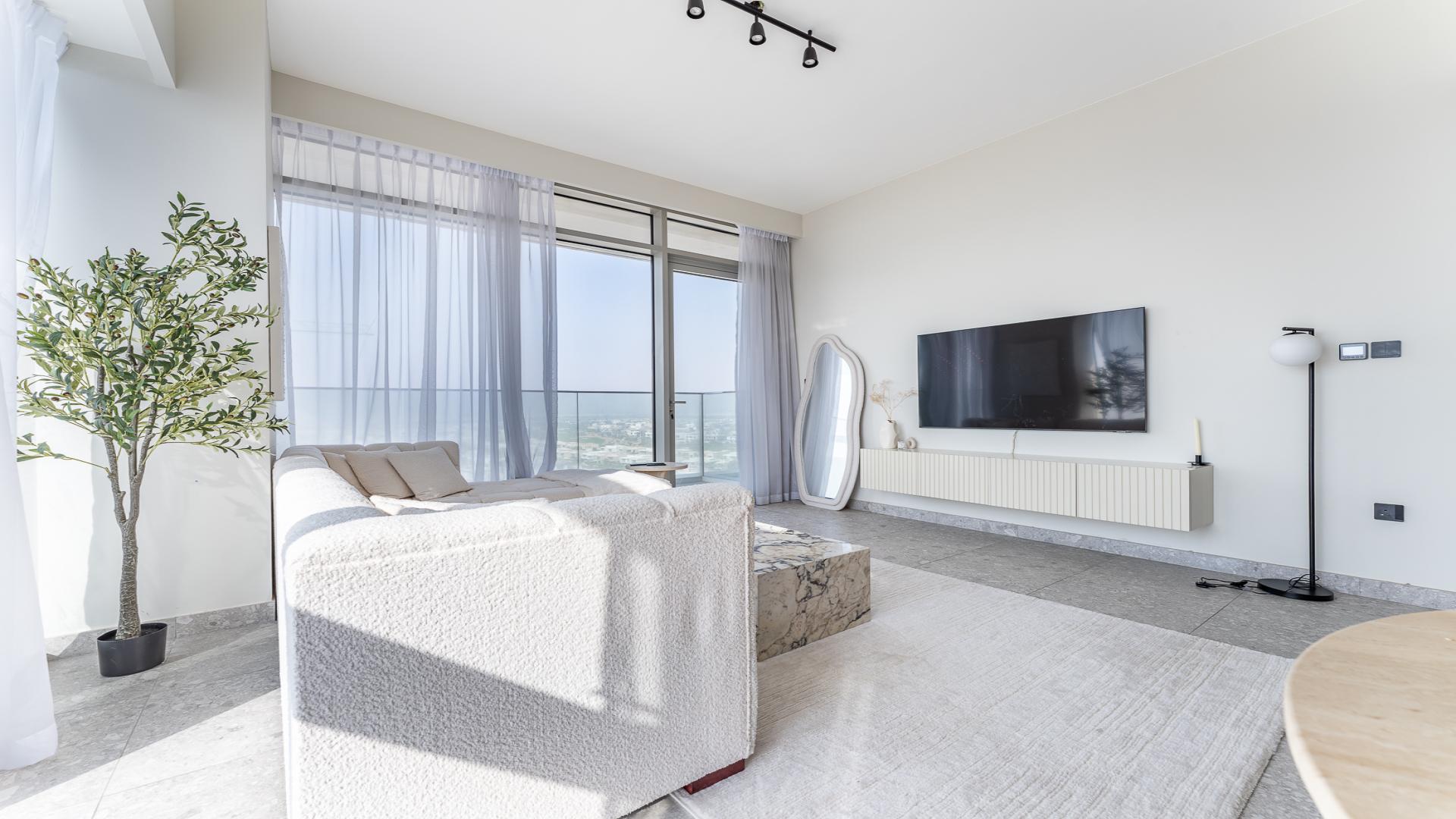 Modern living room and kitchen in Dubai Hills Estate 2-bedroom apartment for rent