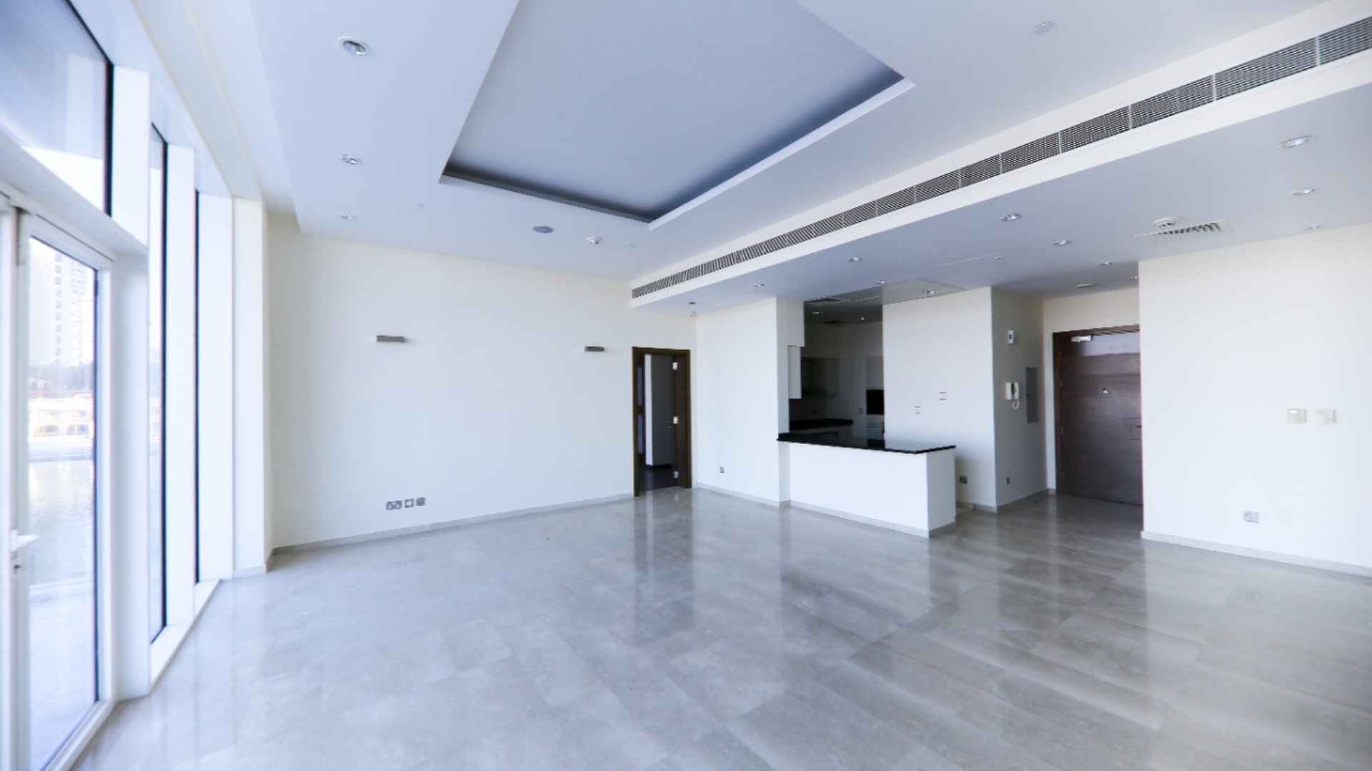 Bright living area in Palm Jumeirah apartment, large windows, modern design, Oceana community