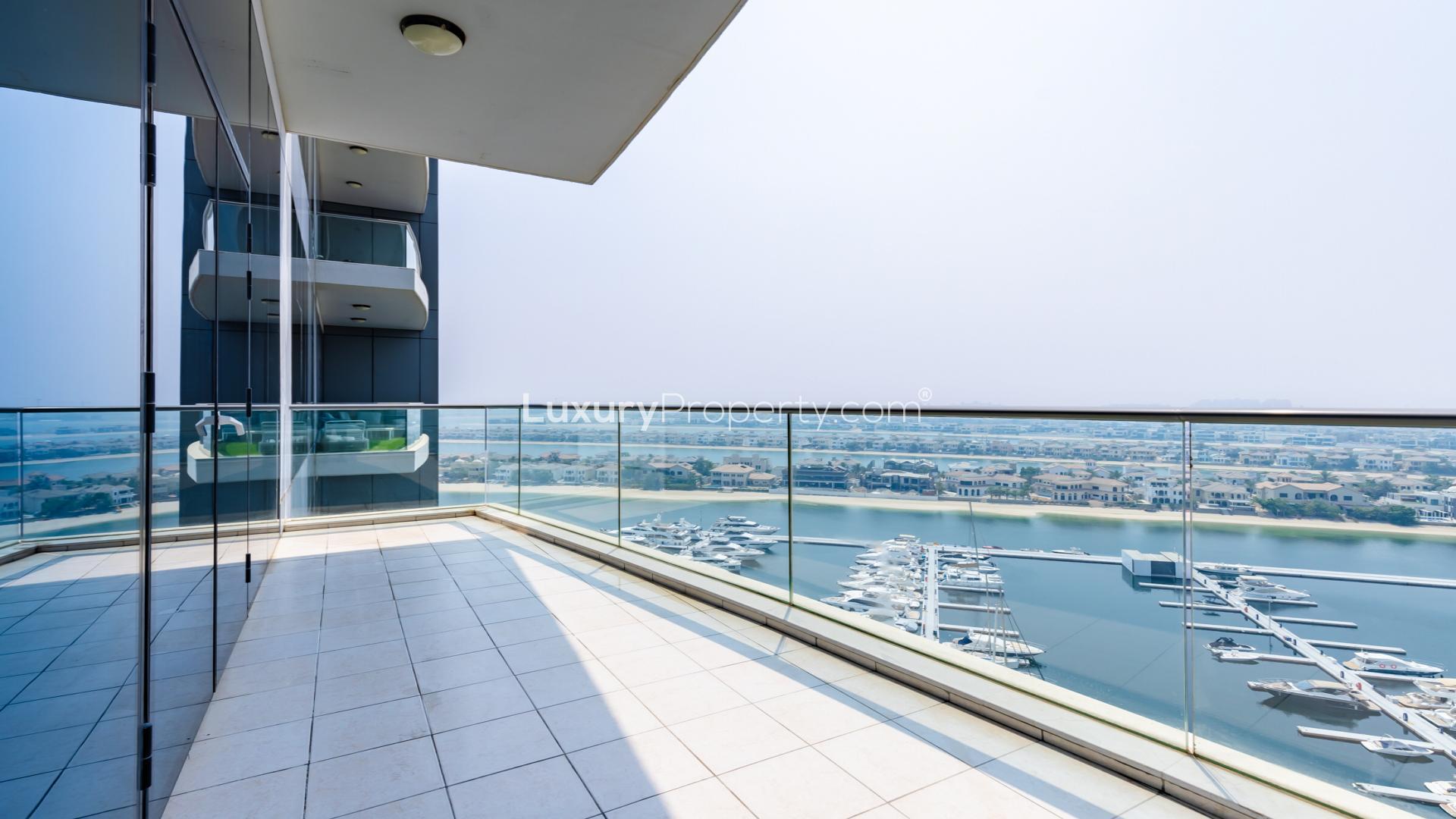 Spacious living area with modern kitchen in Oceana Caribbean apartment, Palm Jumeirah