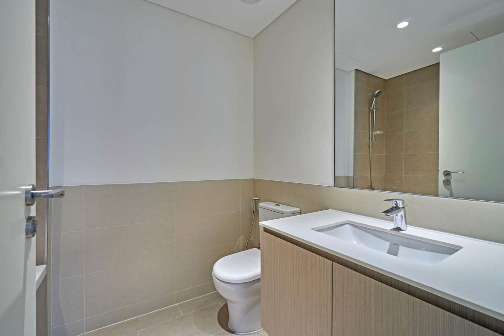 Empty living room with balcony view in Park Heights I, Dubai Hills Estate apartment