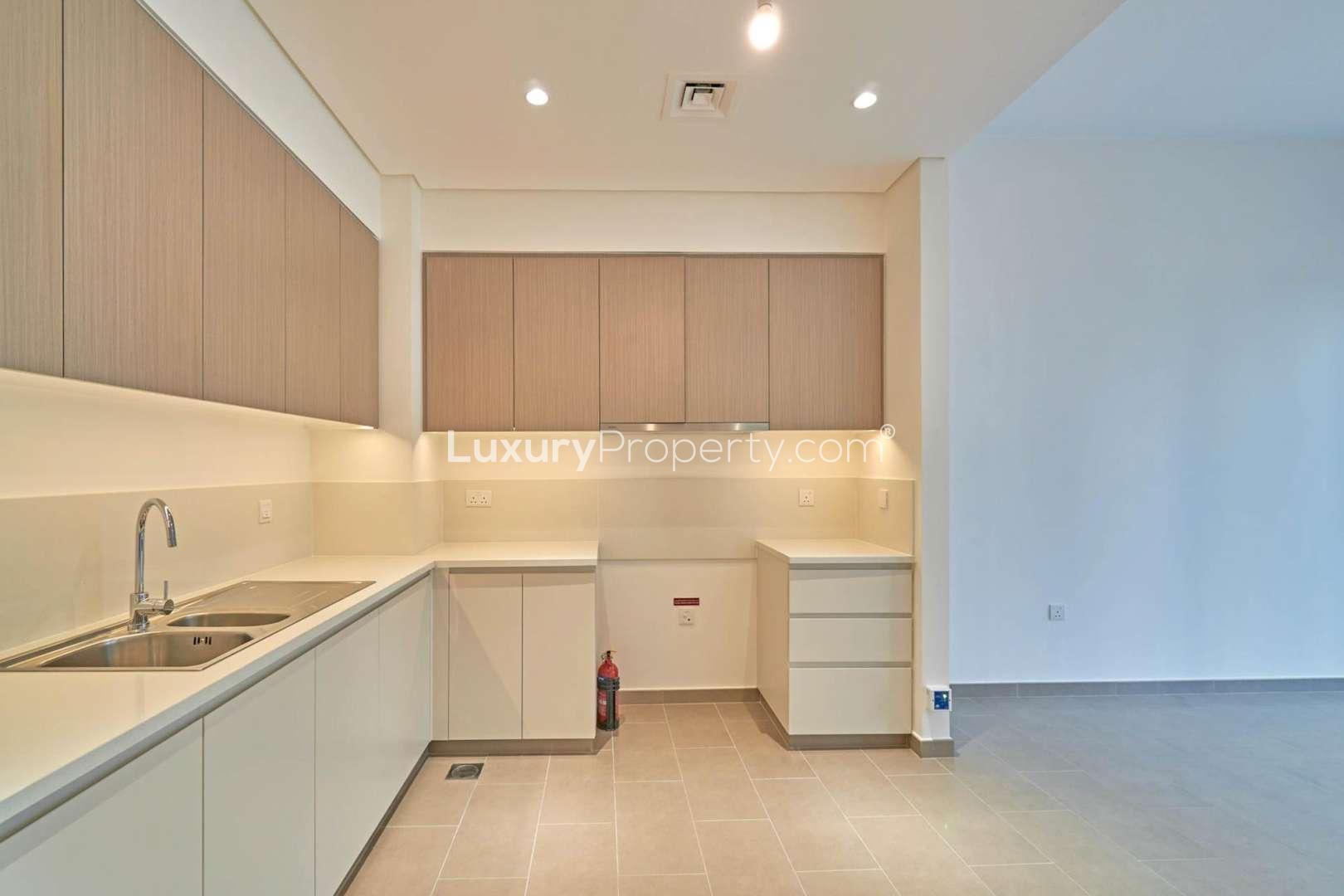 Aerial view from Park Heights I apartment, Dubai Hills Estate, overlooking city skyline and roads