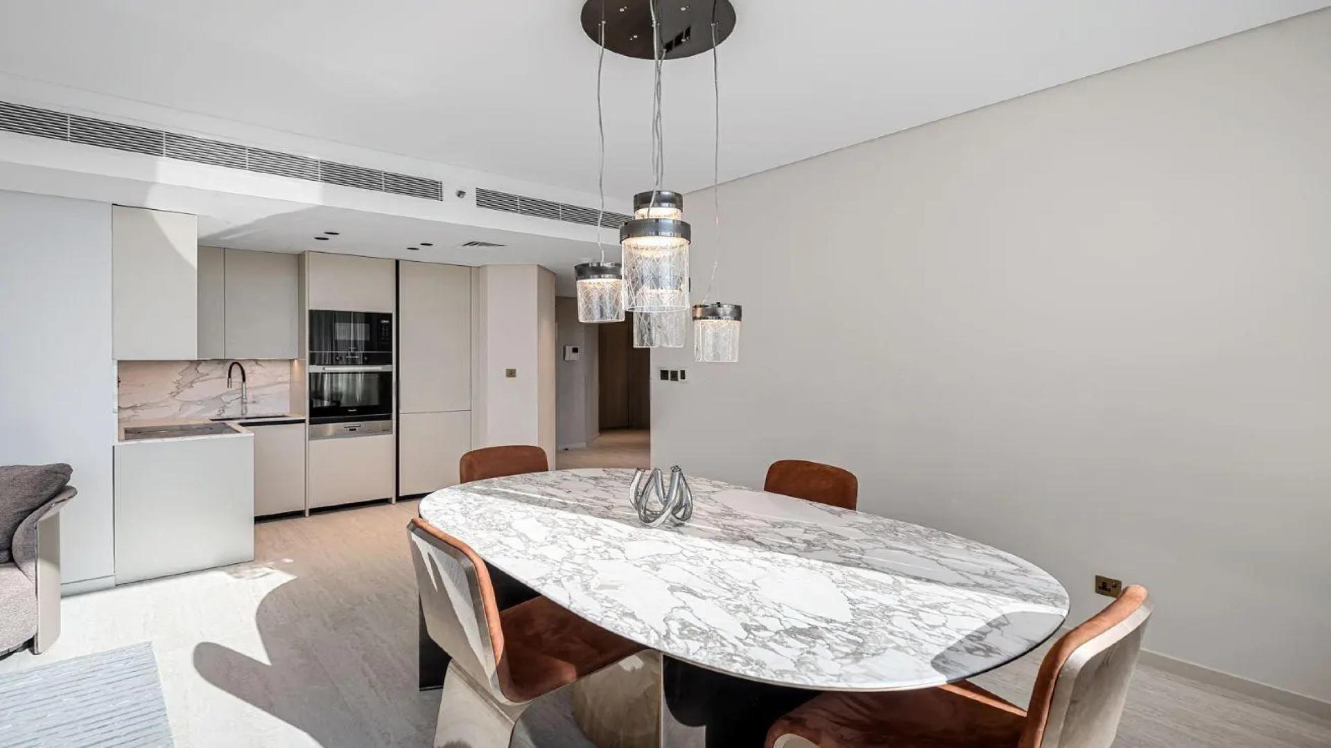 Modern kitchen with sleek appliances in Sky Gardens apartment, DIFC, available for rent