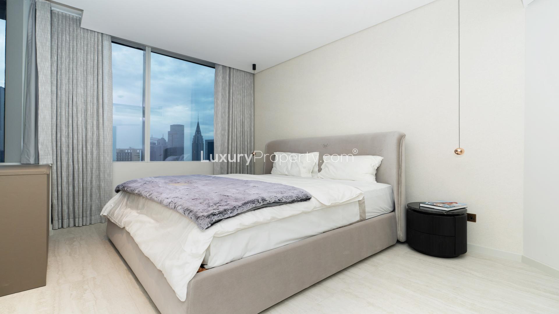 Dining area in spacious 2-bedroom Sky Gardens apartment, DIFC, with modern decor and lighting