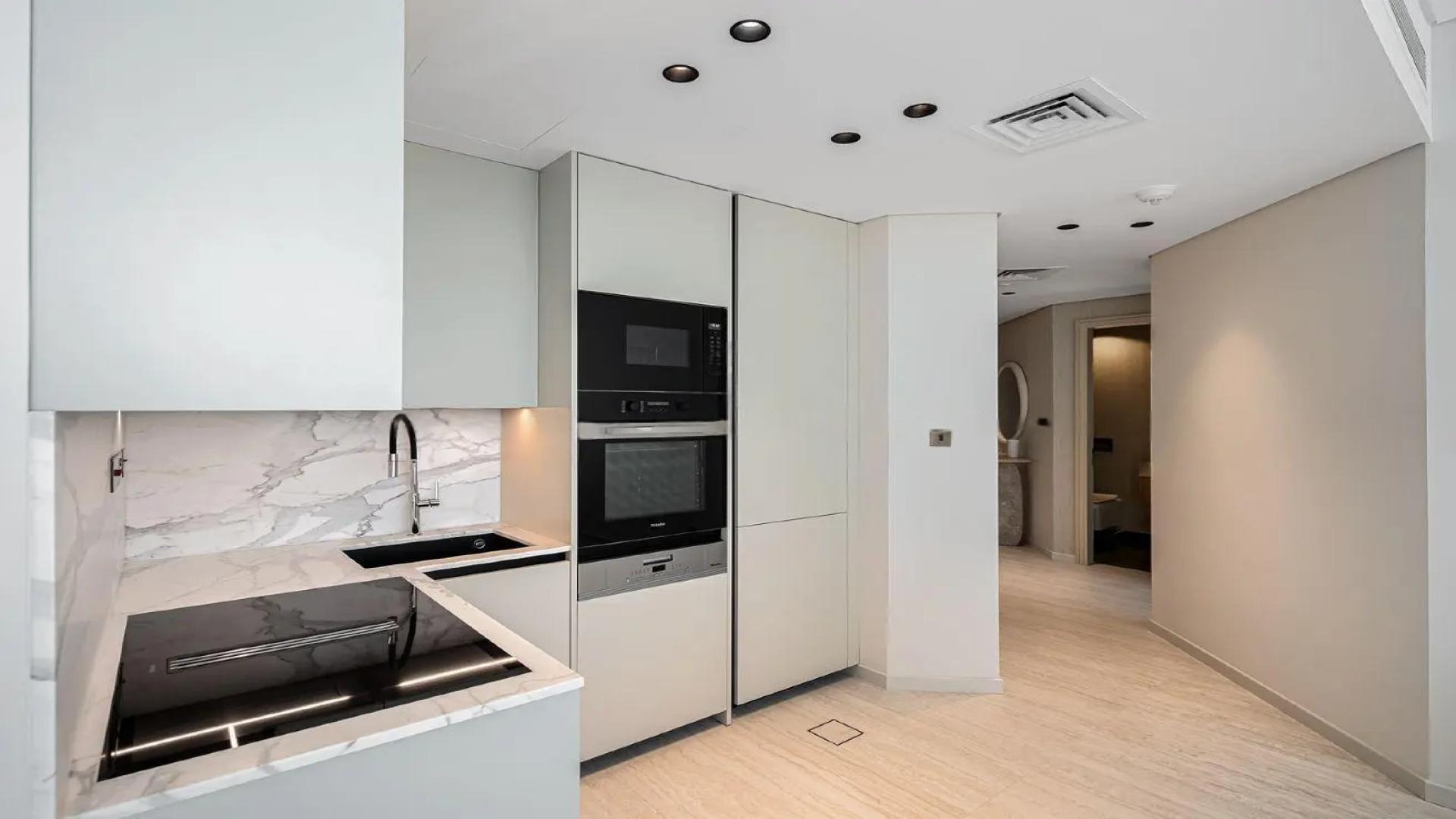 Spacious living area with modern furniture in Sky Gardens apartment, DIFC for rent