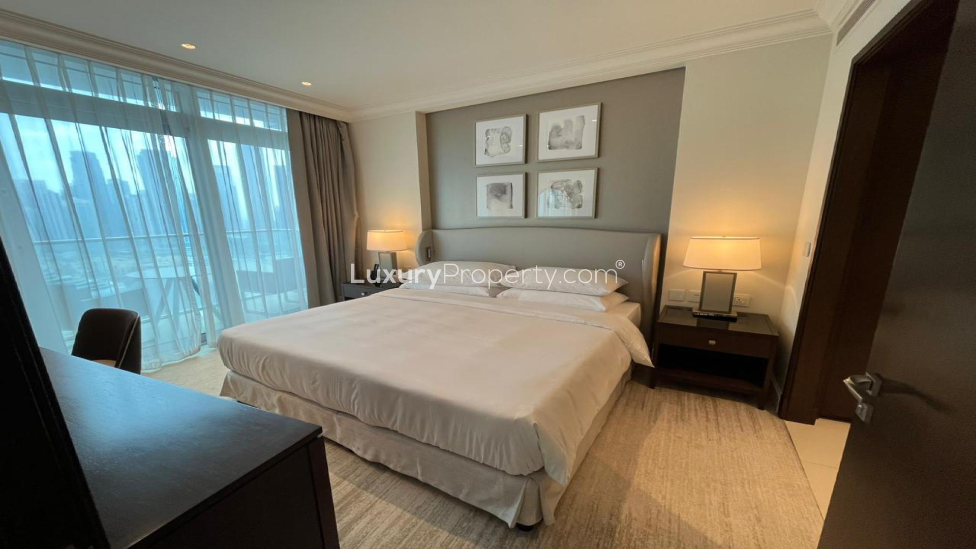 Modern living room in Vida Residences apartment, Downtown Dubai, with elegant decor and large window