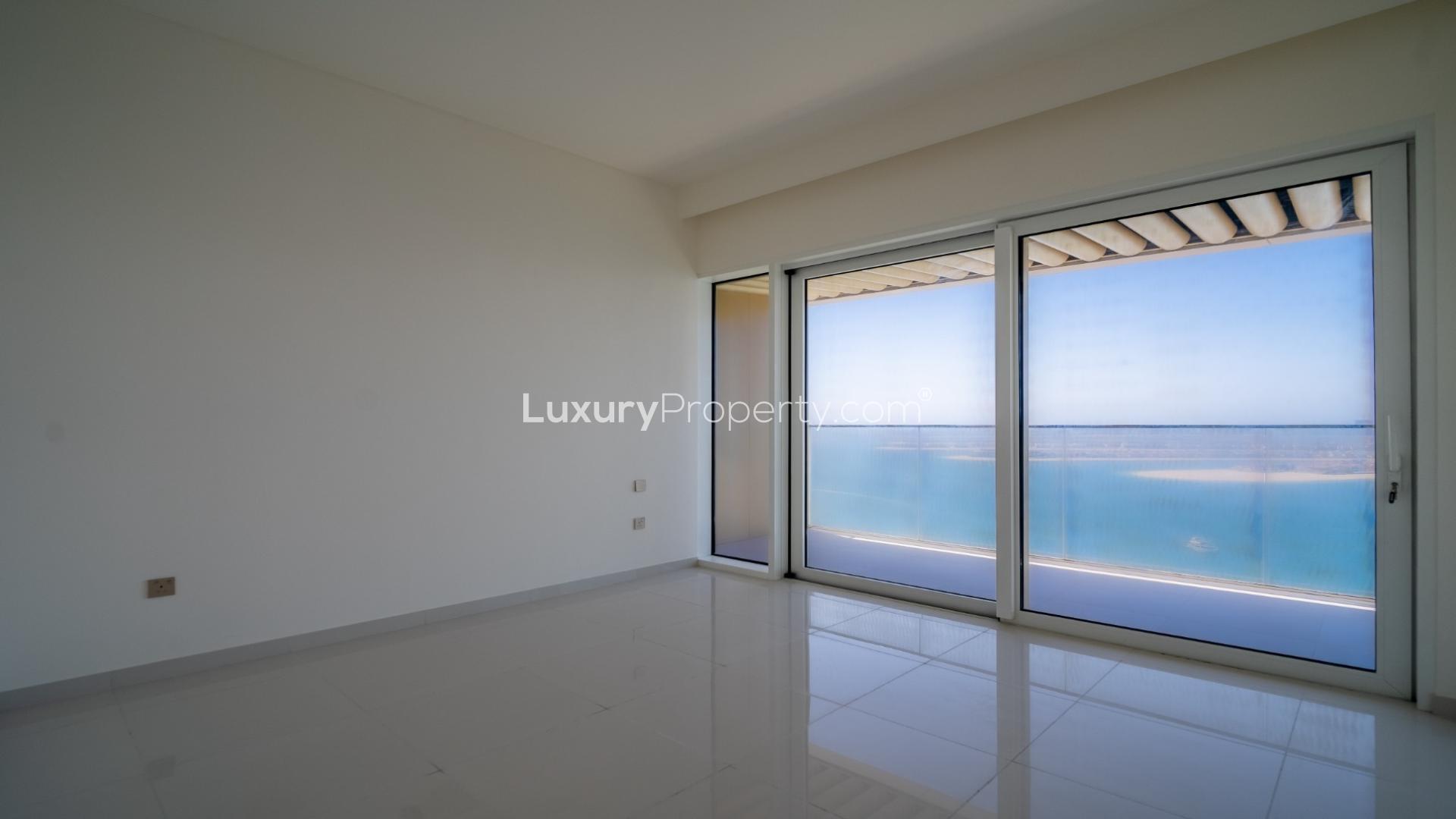 Stylish open-plan kitchen and living area in Elie Saab apartment, Dubai Harbour