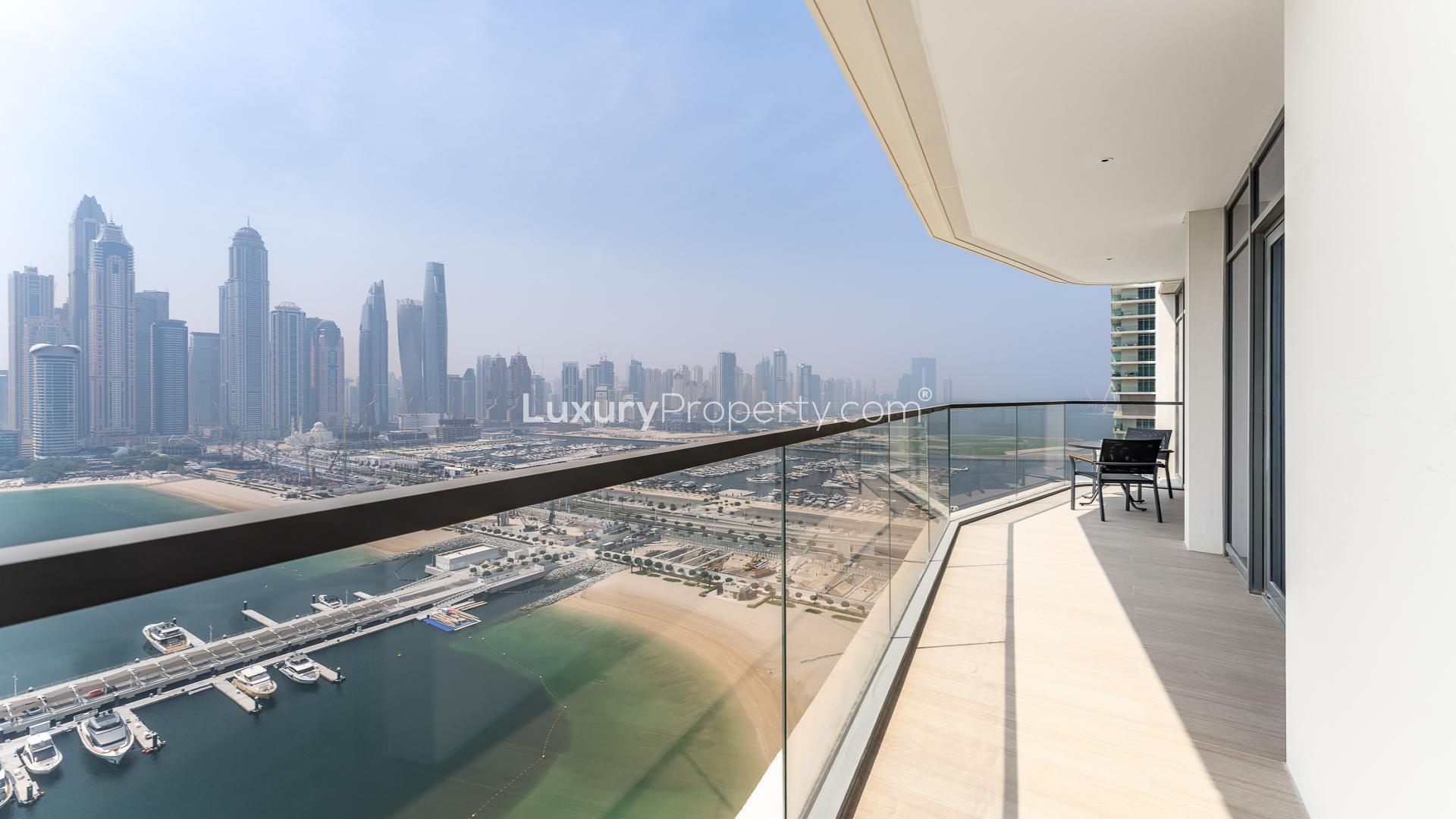 Modern living room with skyline views in Marina Vista apartment, Dubai Harbour