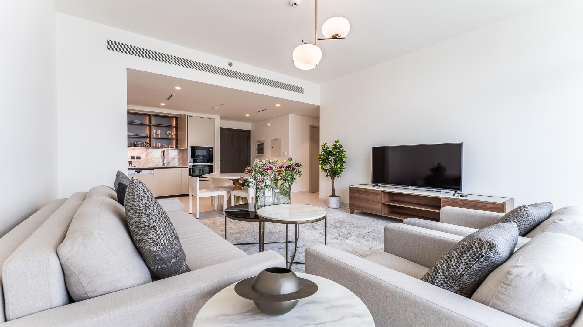 Luxurious balcony view of Dubai Harbour skyline from Emaar Beachfront apartment for rent