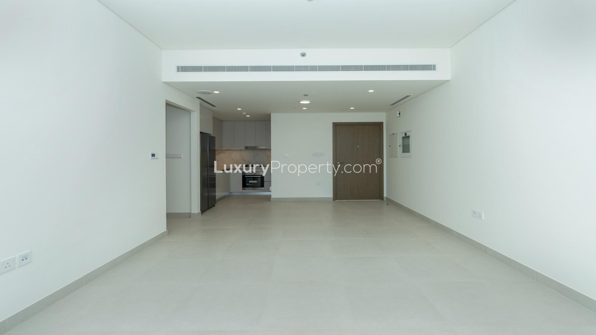 Modern living area in two-bedroom apartment, Emaar Beachfront, Dubai Harbour, open space design