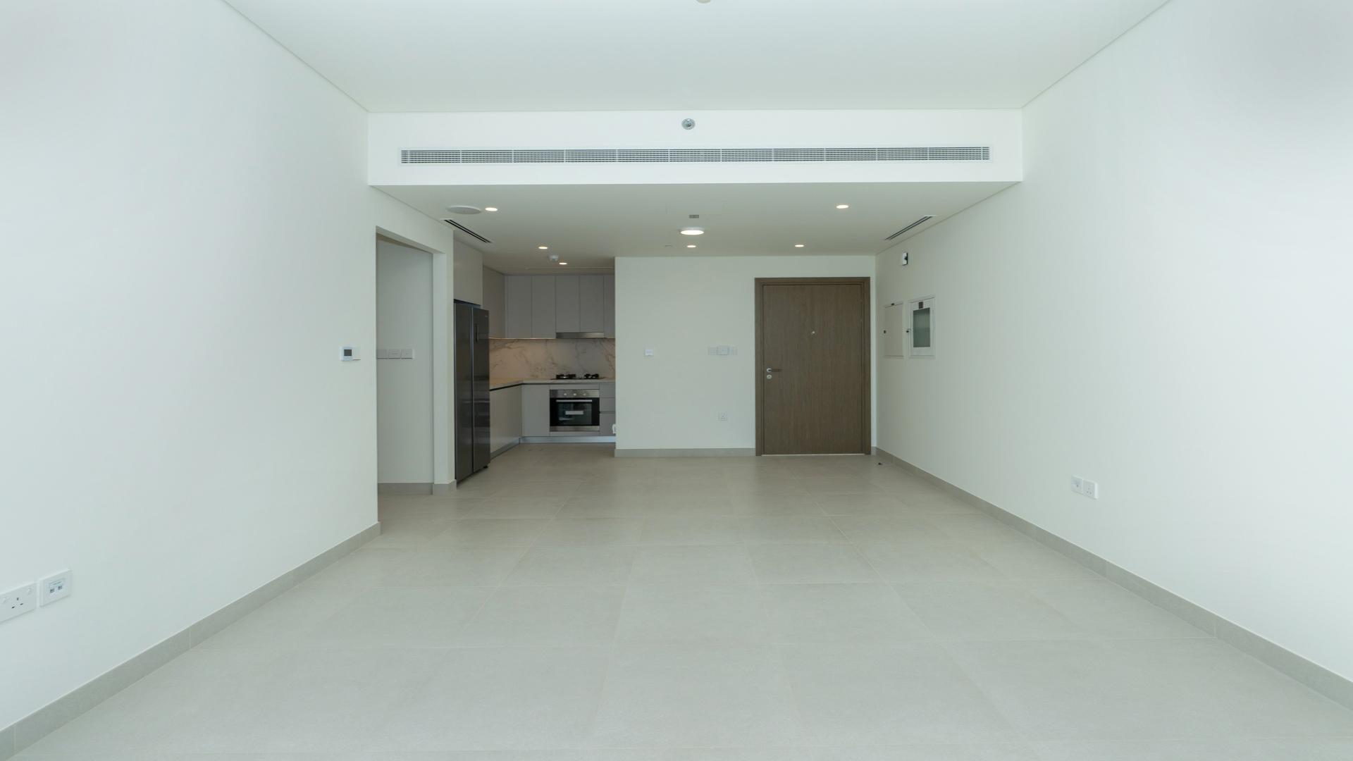 Modern living area in two-bedroom apartment, Emaar Beachfront, Dubai Harbour, open space design