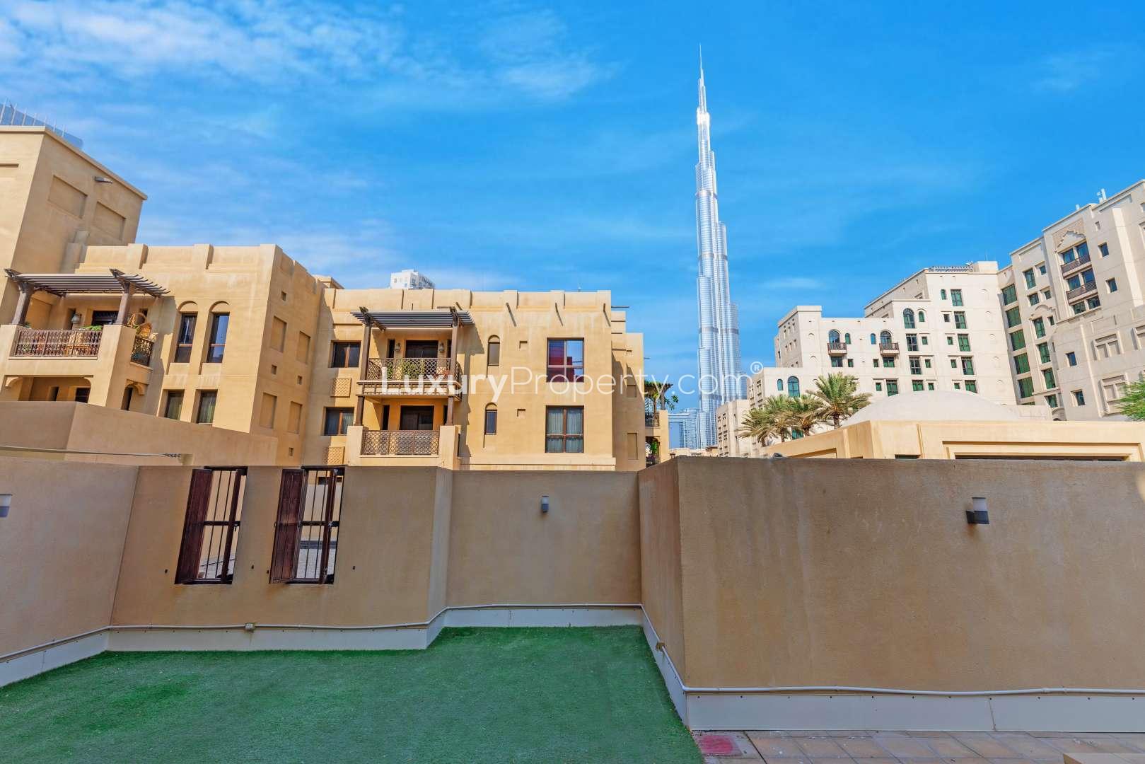 Outdoor terrace with Burj Khalifa view in 2-bedroom Old Town apartment for rent