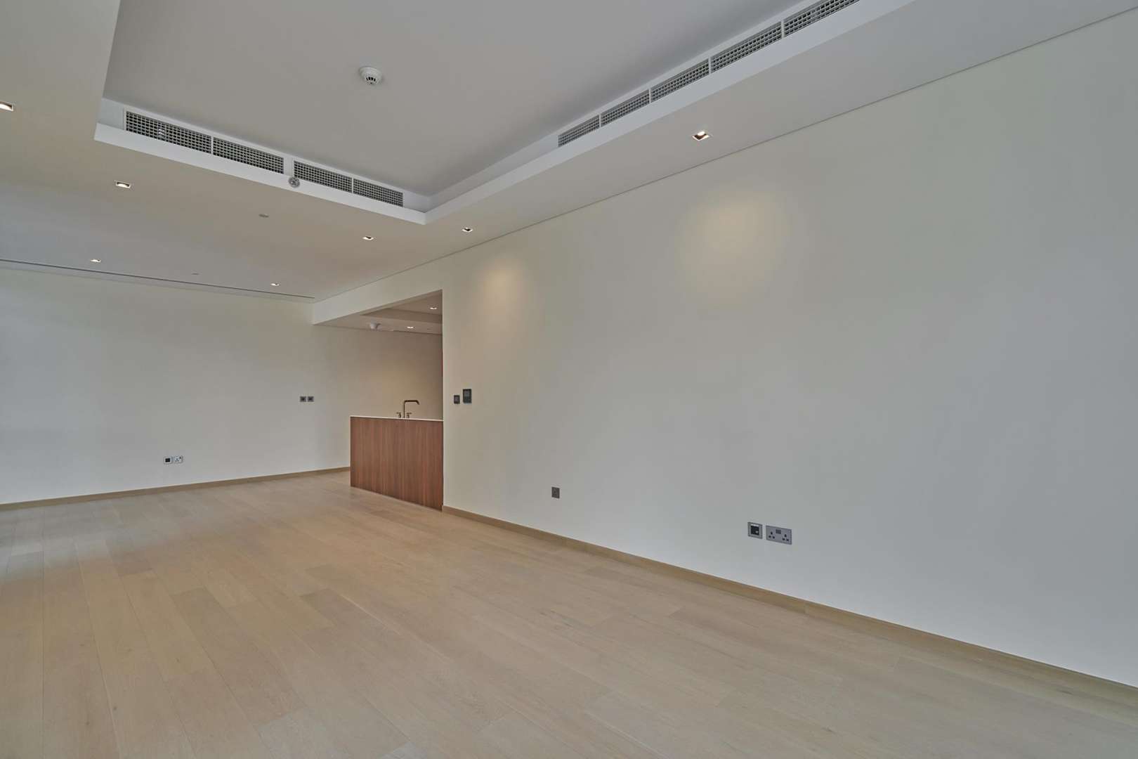 Luxurious open-plan kitchen and living area in RP Heights apartment, Downtown Dubai