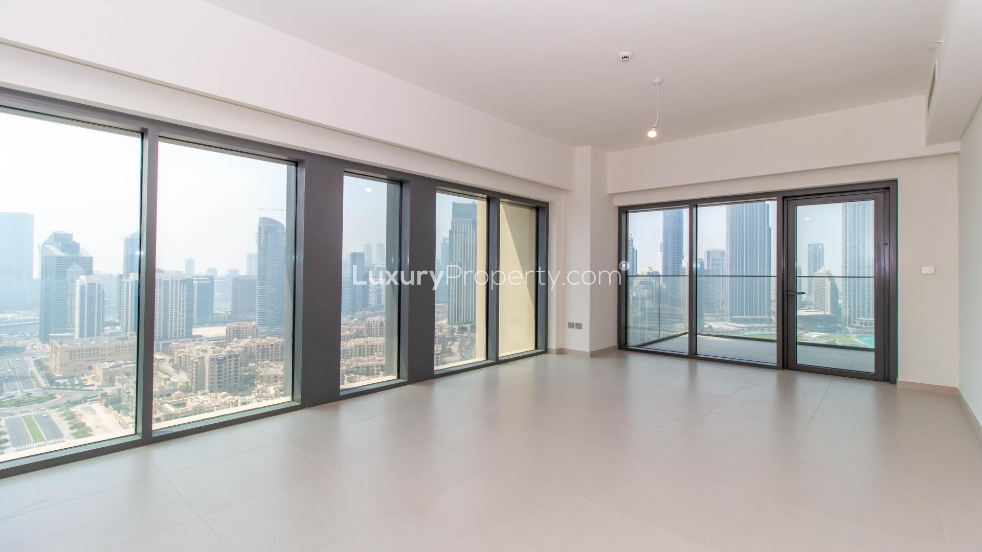 Spacious living room with city views in Burj Royale apartment, Downtown Dubai